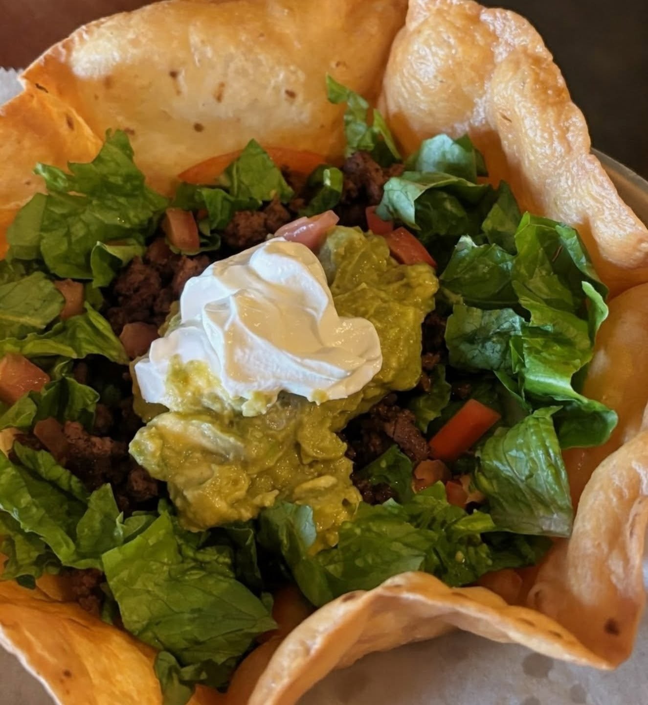 Tonight: taco salad with ground beef and fresh guacamole, $9. Or get our buffalo chicken ranch tacos for $3 each 🌮 🍻