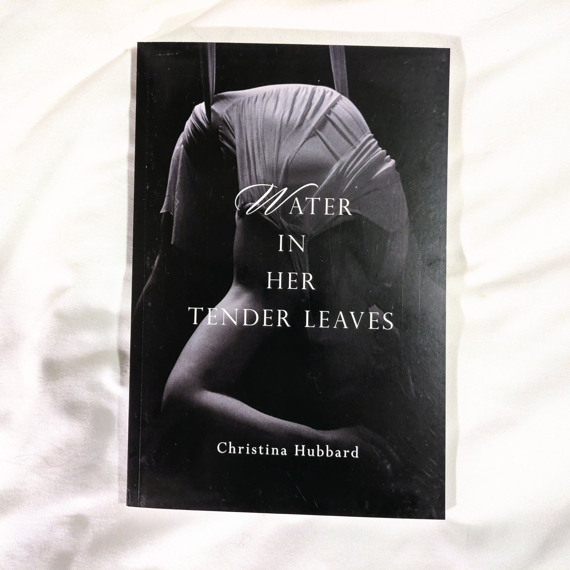 Image of cover of Water in Her Tender Leaves, black and white cover