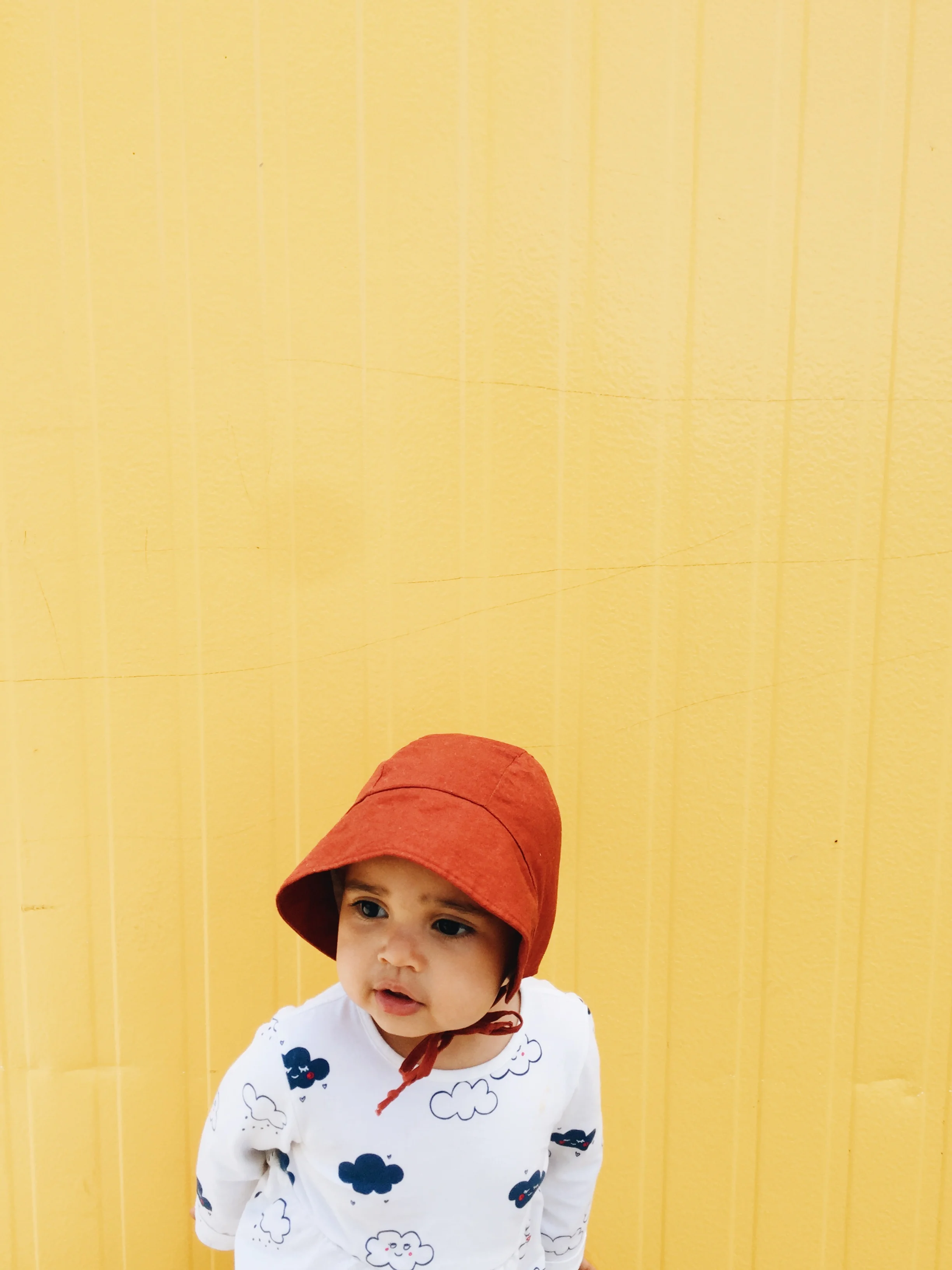 Quick photo before going in to Ikea, because a girl can't resist a cute babe and a bright colored wall. 