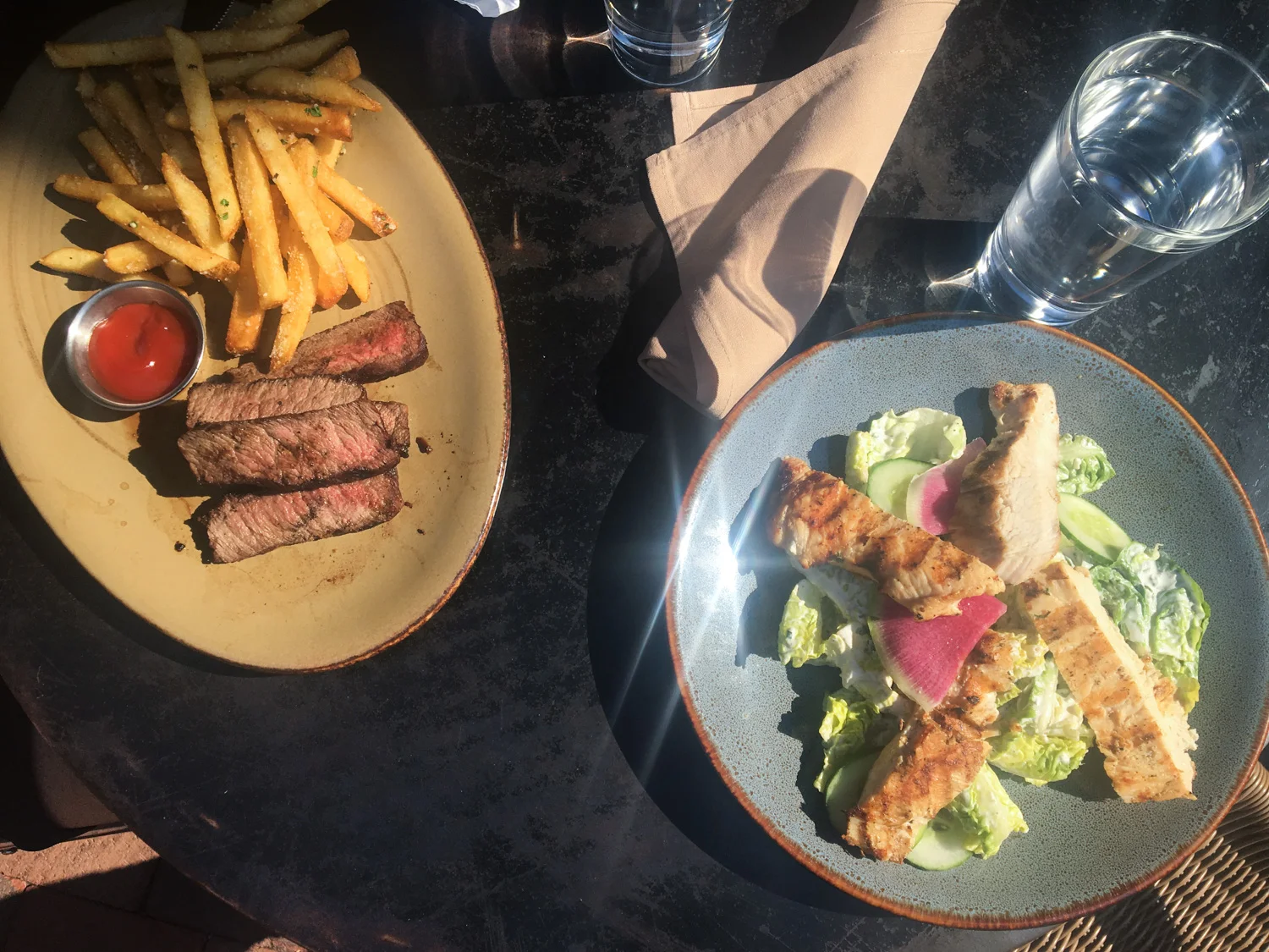 Late lunch at Virtue Feed & Grain. Steak & Fries (left) and Little Gem Lettuce Salad (right).
