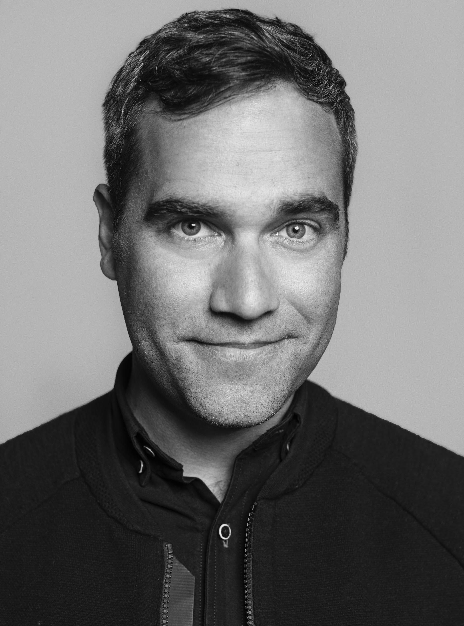 samheadshot copy.png