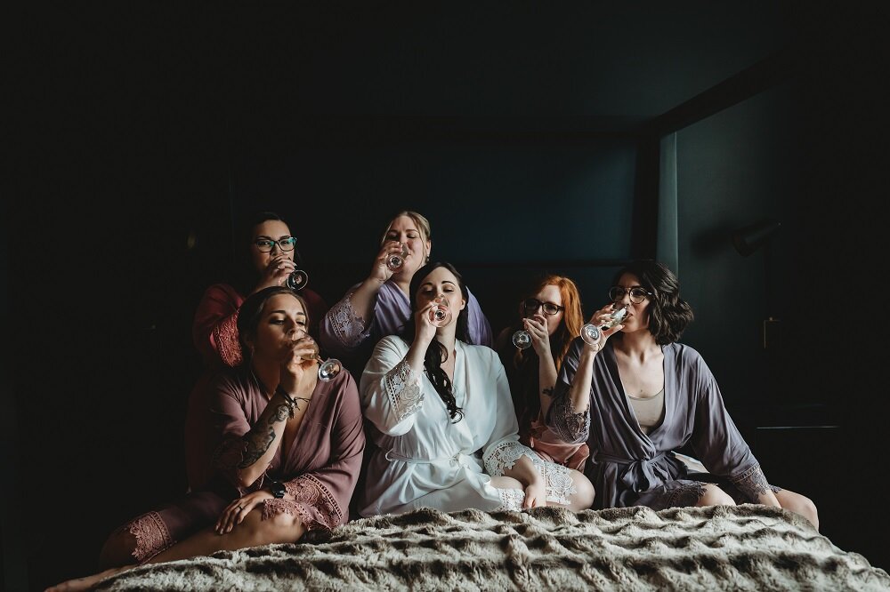 Bride and bridesmaids getting ready at hotel