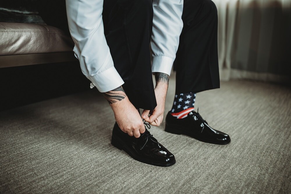 groom getting ready in hotel