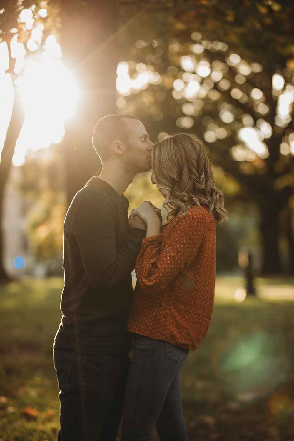 Engagement portraits of couple during sunset. 