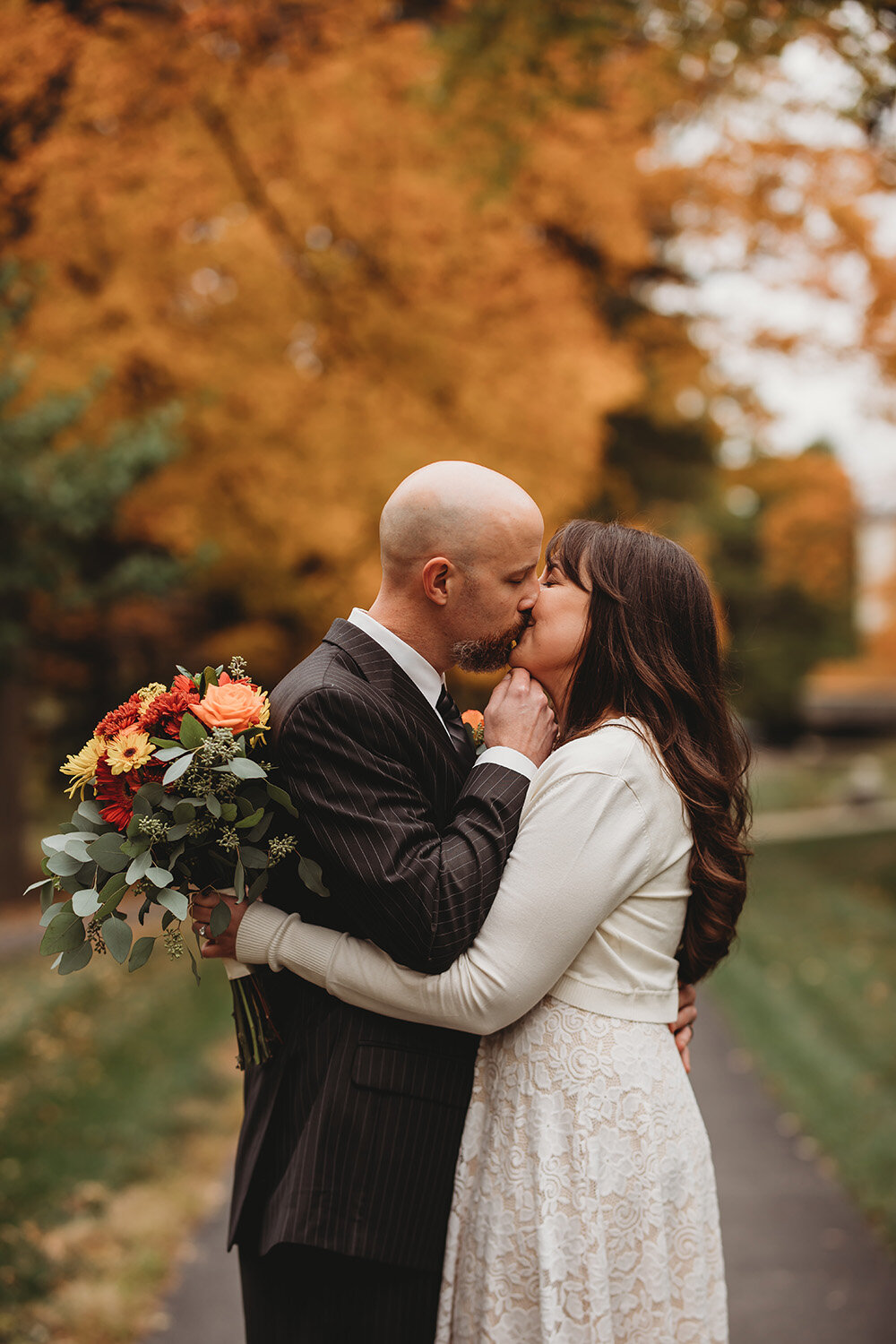 couple sharing a kiss on their wedding day