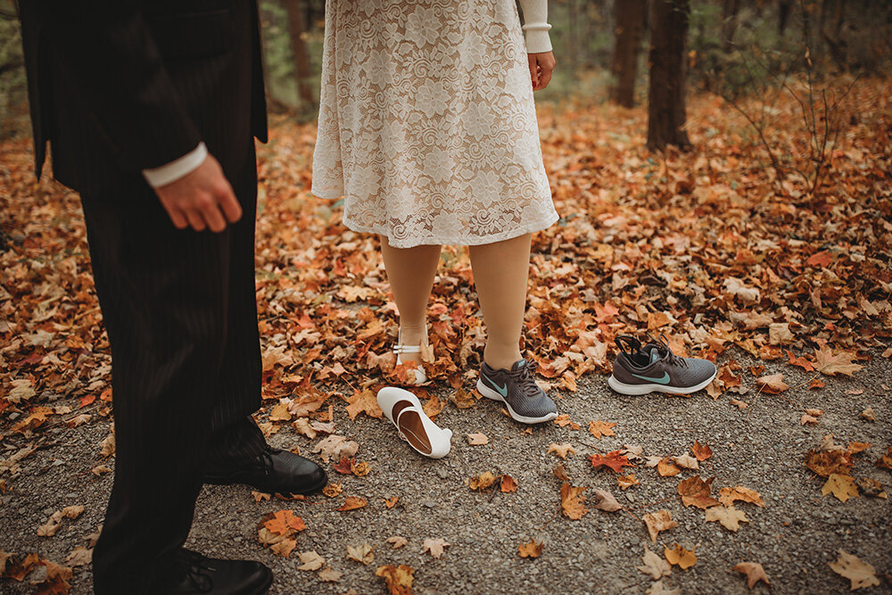 bride changing her shoes