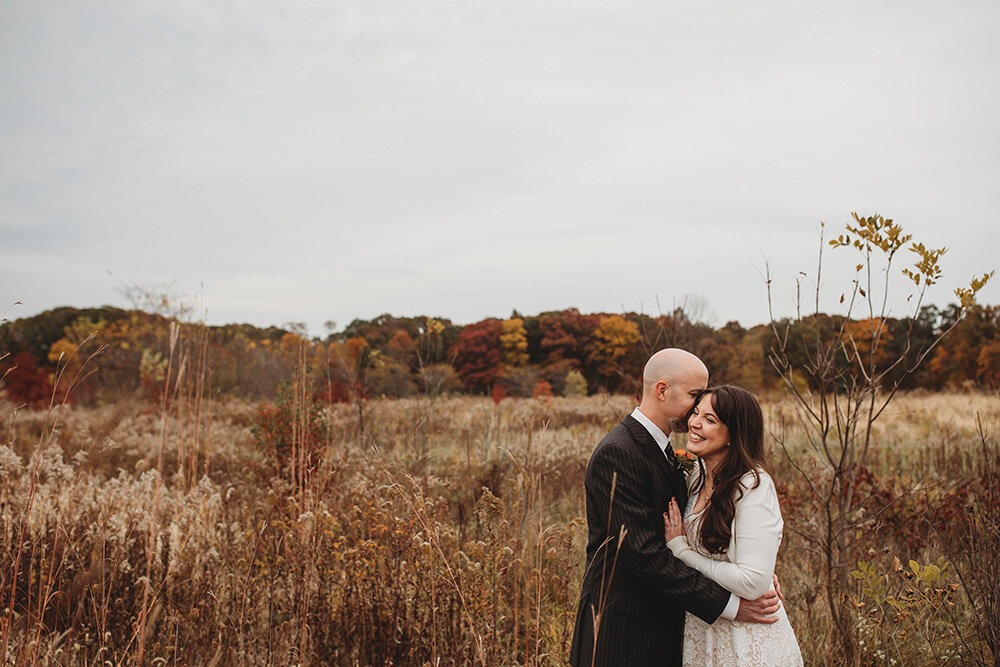 just married couple shares a kiss 