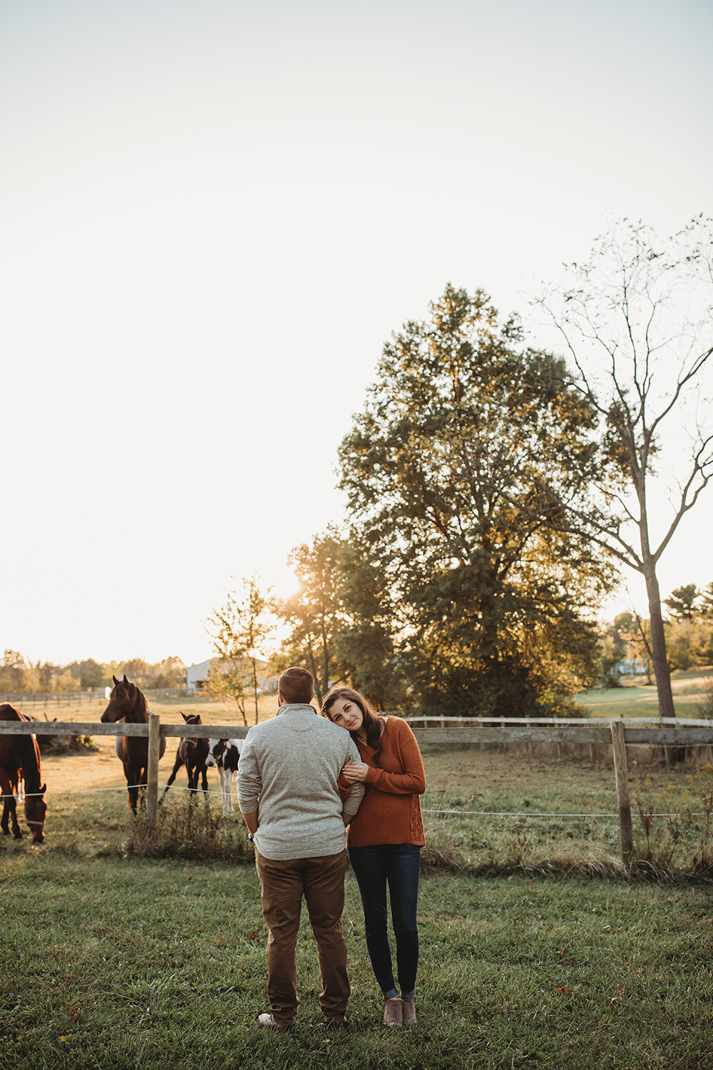 couple portraits by horses 