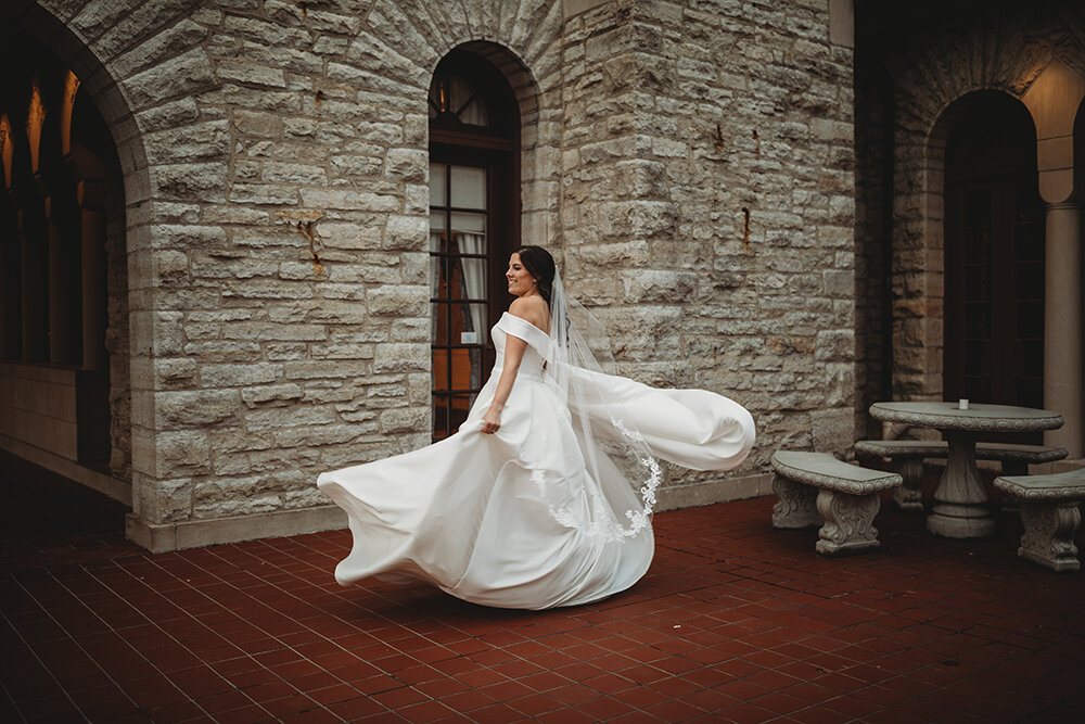 bride spinning in dress 