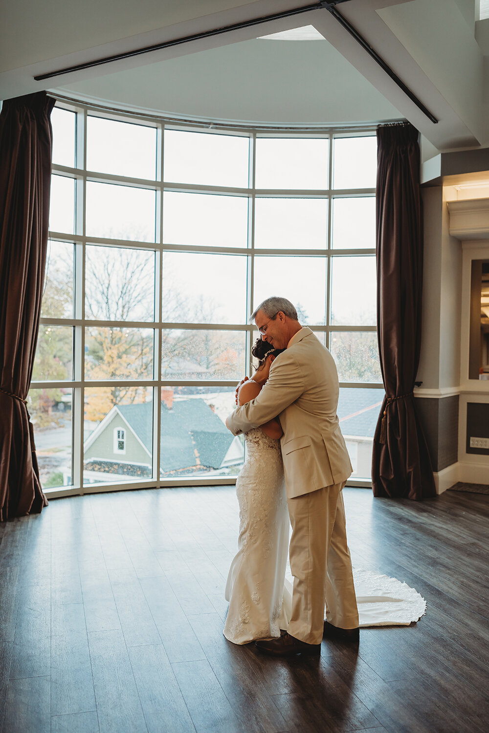 bride hugging father 