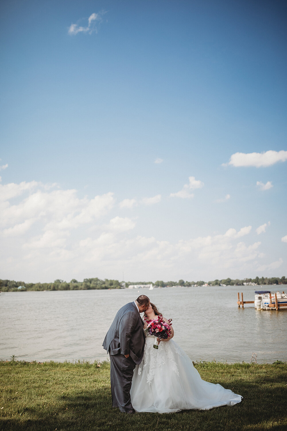 bride and groom by the lake 