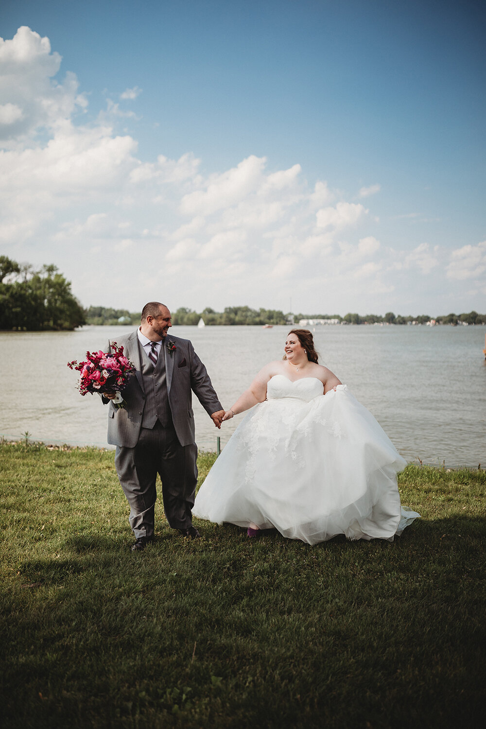 bride and groom by the lake