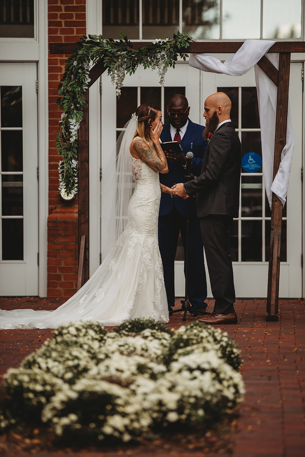 bride and groom at altar 