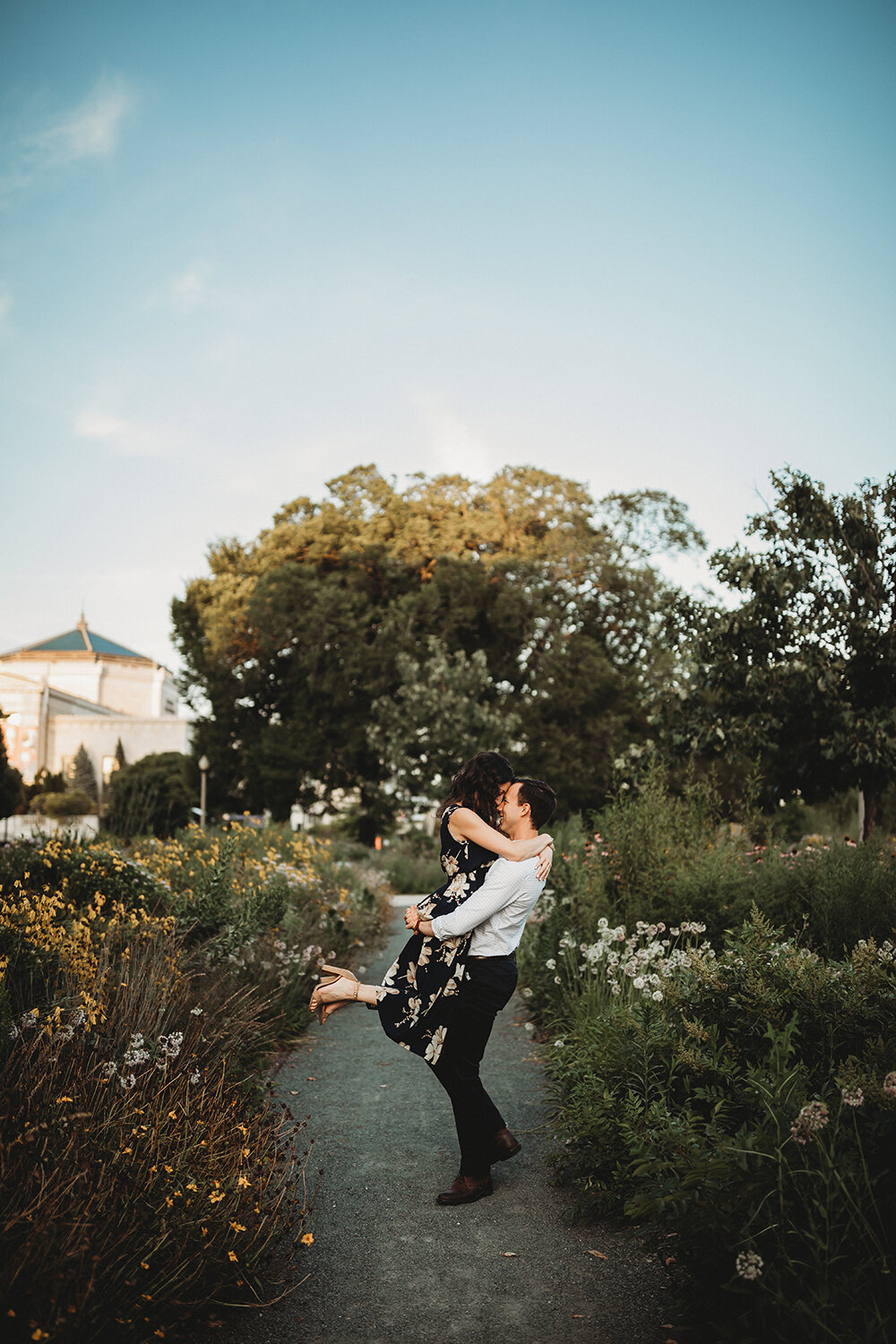 couple engagement portraits in garden