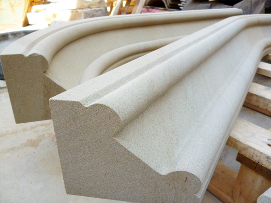 Detail of hand crafted stone window and door arches.