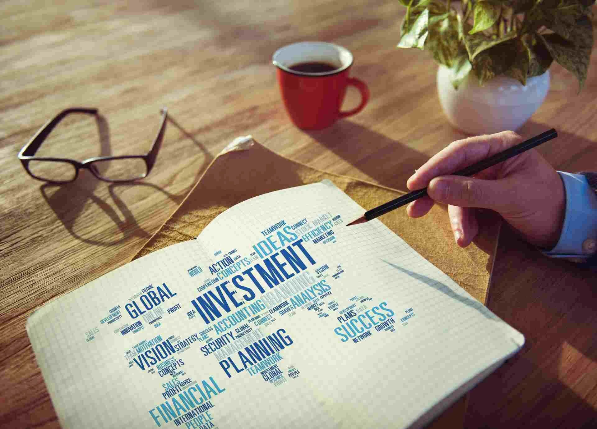 Notebook with investing terms