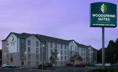 WoodSpring-Suites-Cherry-Hill-Extended-Stay-Hotel-Exterior-Dusk-2-738x456_400.jpg