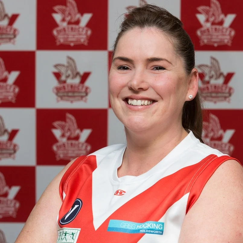 Kate K Jumper #55 is being worn confidently and proudly by Kate K this year. She joined the bloods at the beginning of the 2018 season. Kate brings another crucial profession to the Bloods team- she is a ‘Wound care consultant’, hopefully we won’t have to use her skills! Anna gets a big shout out for recruiting Kate and giving her another thing to be proud of! Away from the field and the hospital you’ll find Kate flying down the slopes on her Snowboard- probably fueled by her love of coffee!