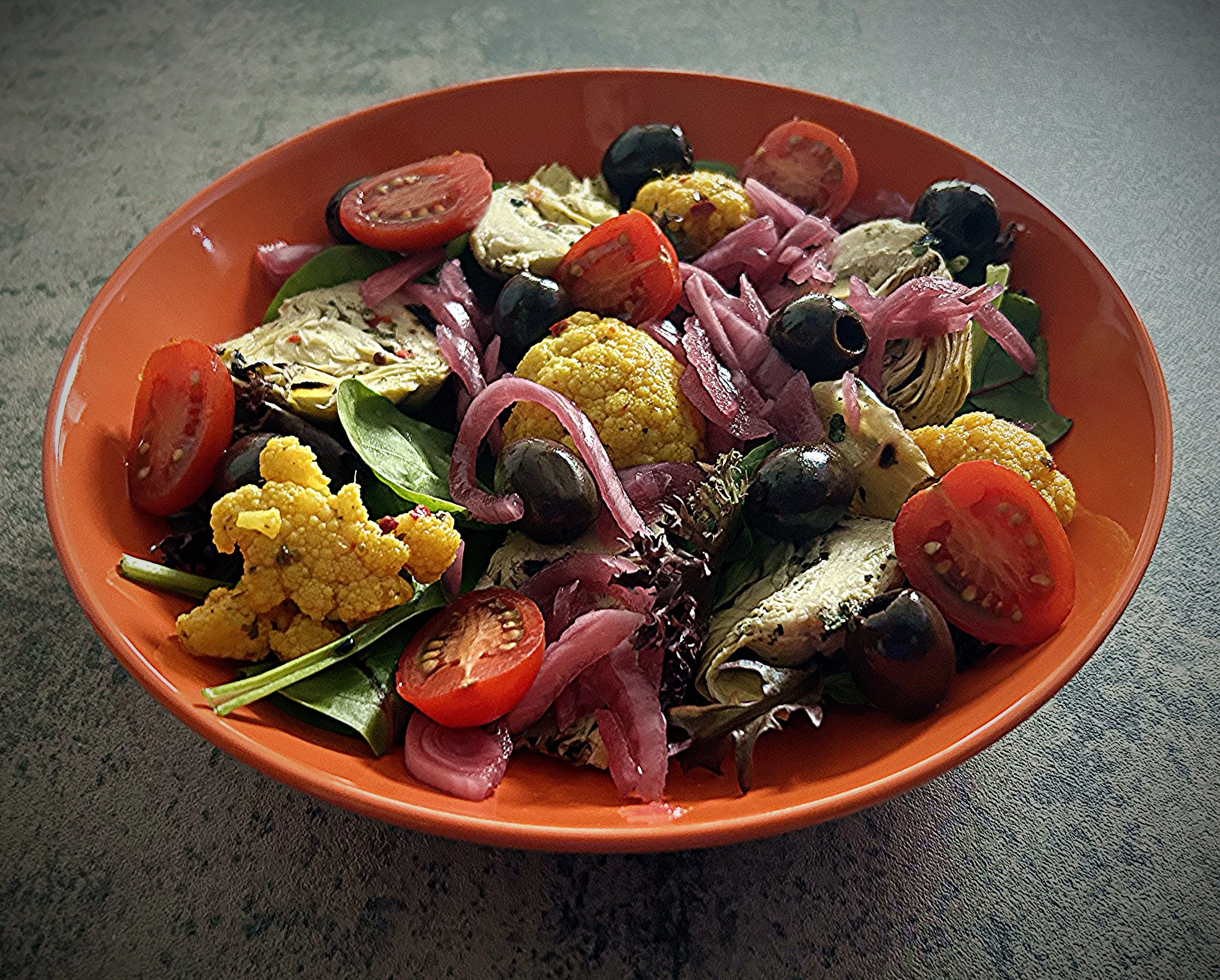 2026-01-21  Baby Leaves Artichoke Hearts Turmeric Infused Cauliflower Pickled Red Onions Black Olives Tomatoes Balsamic Vinaigrette.jpg