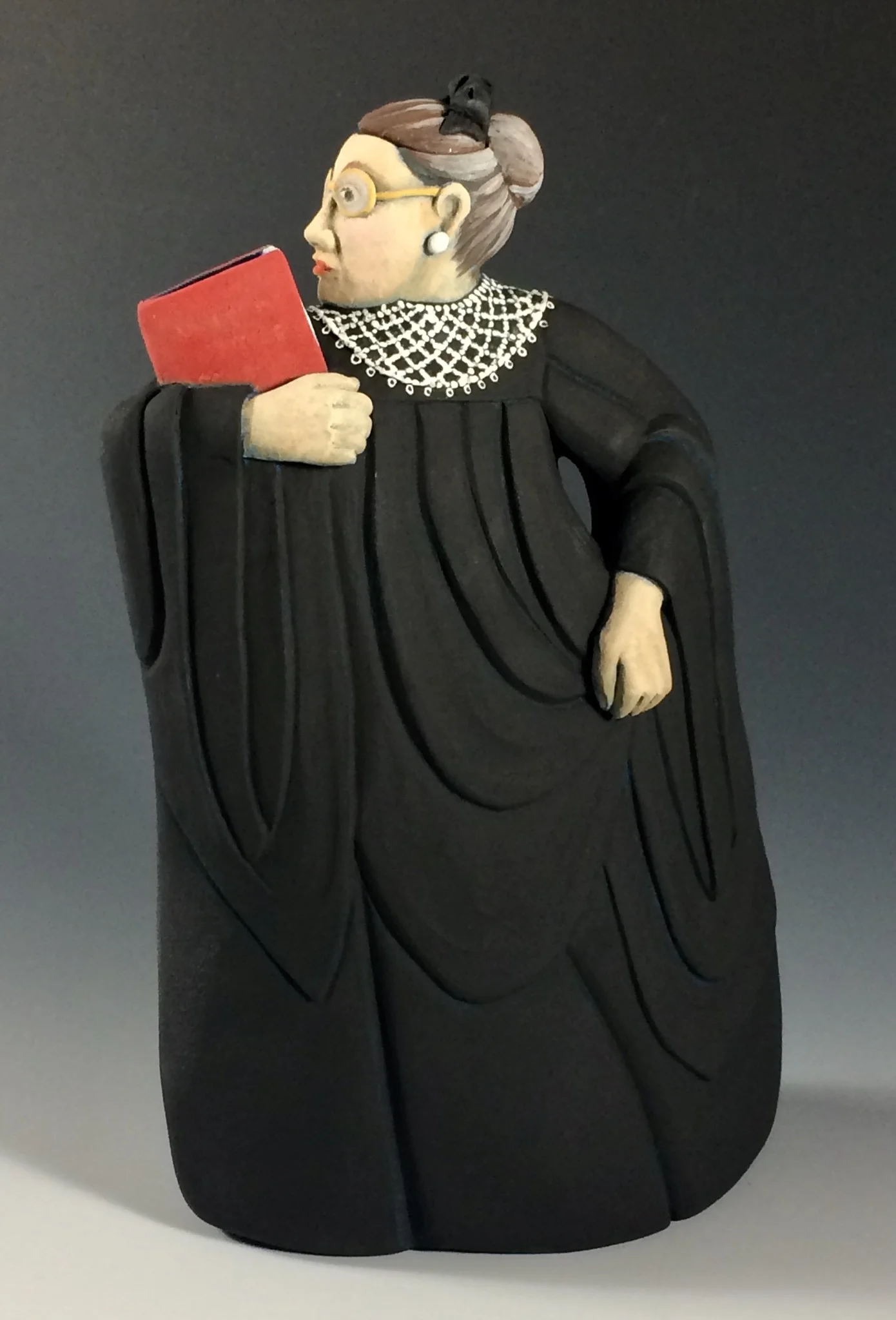 A Ruth Bader-Ginsburg teapot that Carrie Anne Parks created from handbuilding techniques.