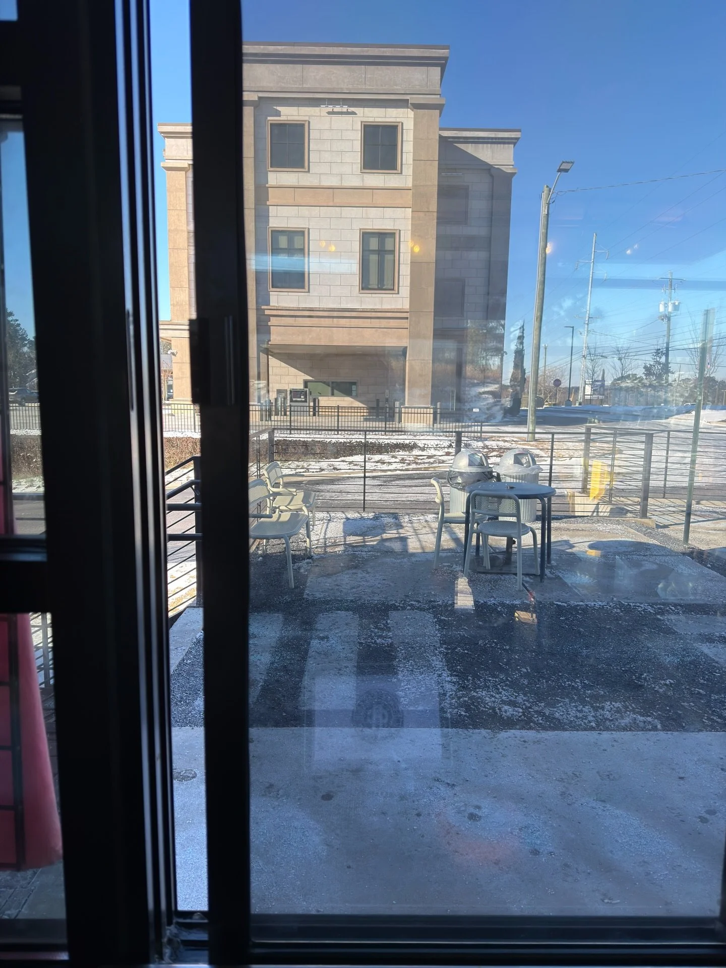 this window might have been frozen like this for half the shift but it was a fun one ⚡️ we&rsquo;re closing up for the day AKA no 🍔🍟🐓🍦 tonight. closed tomorrow as usual then blasting off a standard Tuesday unless another winter weather event want