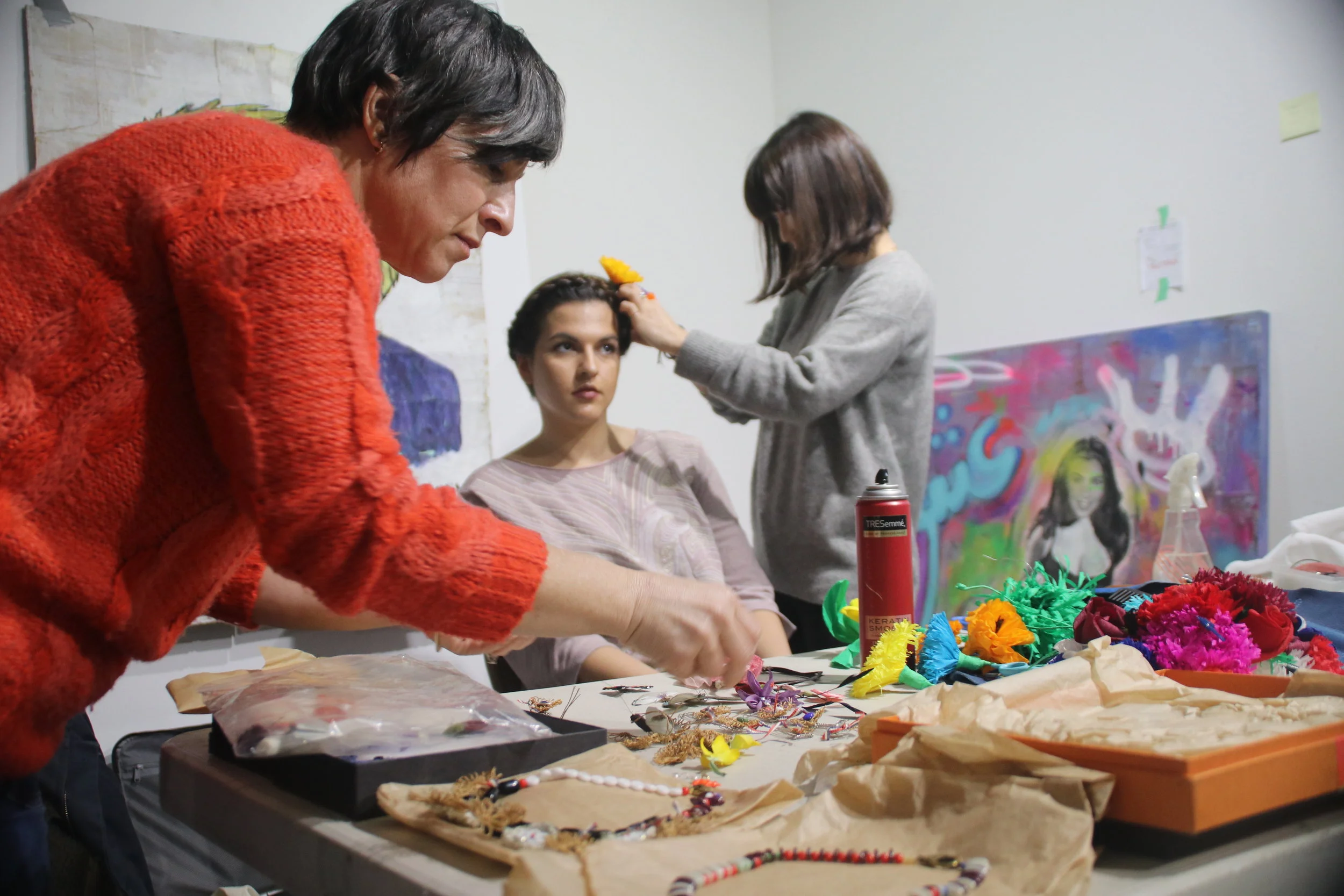  Women and men (not in photo) work hand-in-hand to put together "Illegal Fashion Runway"—an art-fashion show dedicated to people of immigrant backgrounds—at Whitebox Art Space, New York. (Feb. 14, 2017) 