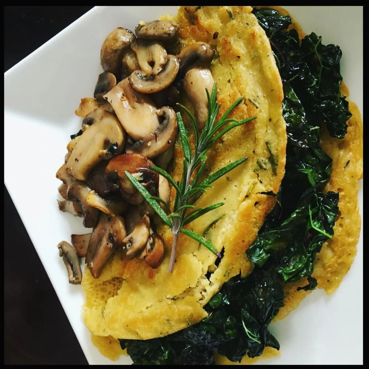 Chickpea Crepes with massaged kale and sautéed mushrooms