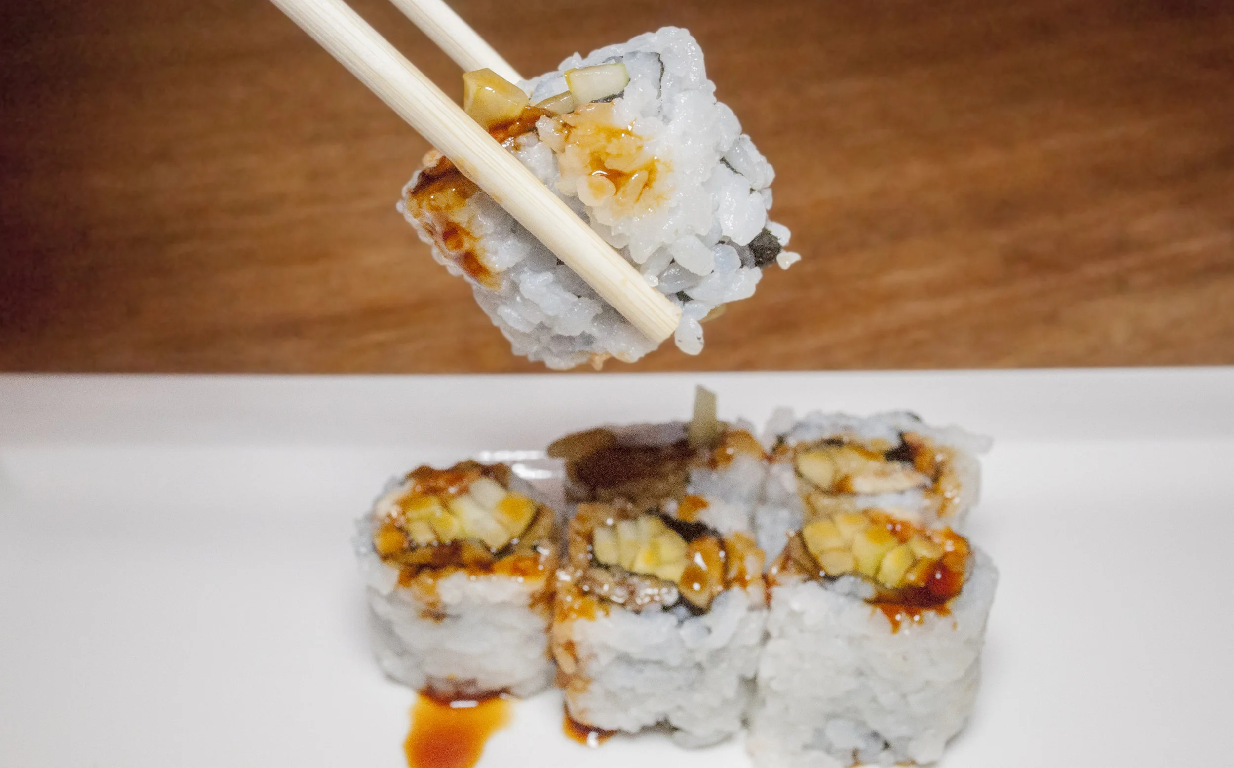 momo-sushi-with-chopsticks.jpg
