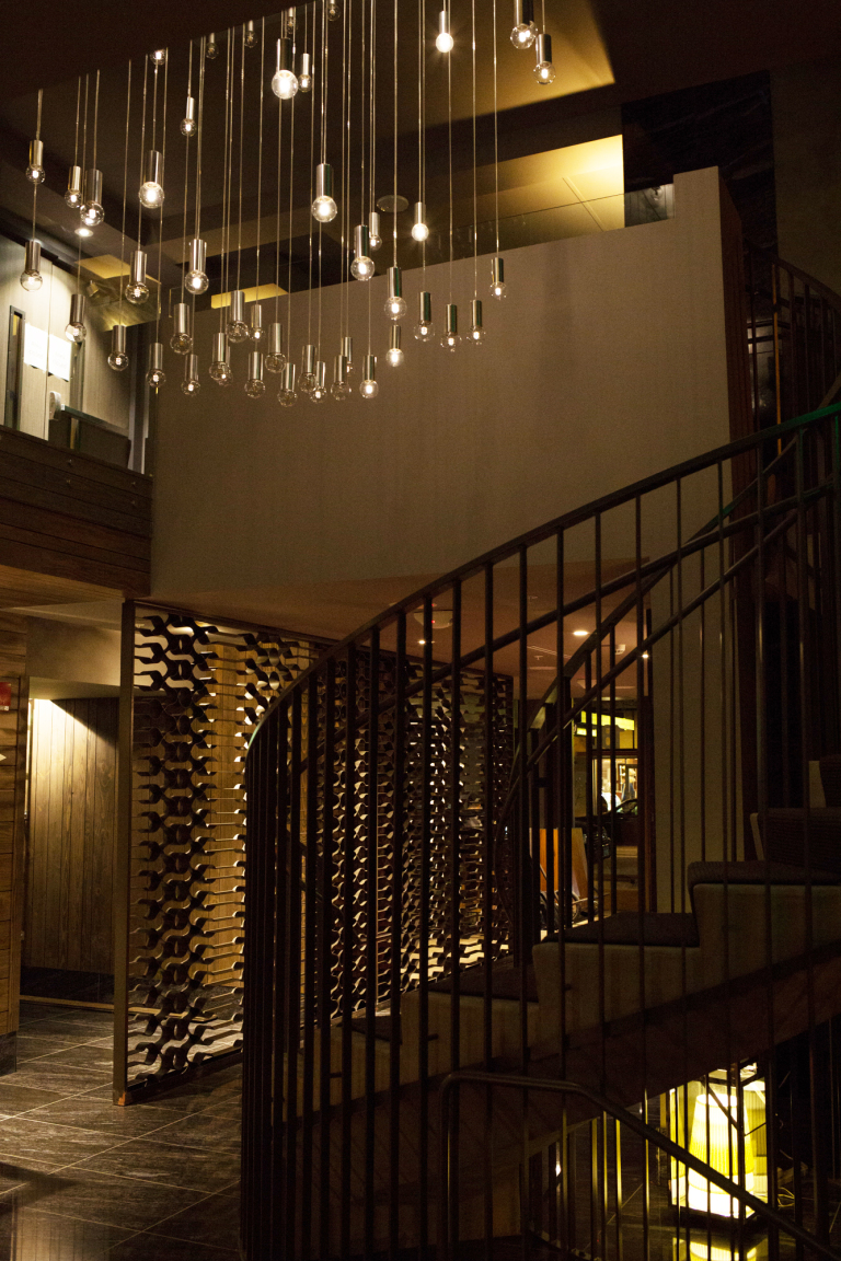 It is a dynamic sculpture of 100 dimmable LED bulbs that uses brightness and motion to create visualizations of data.