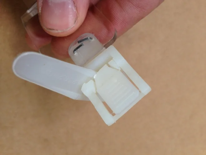  During the concepting phase we explored tons of different closure methods that would allow for adjustable pressure. This was my favorite creation: the side access Zip-Tie.   