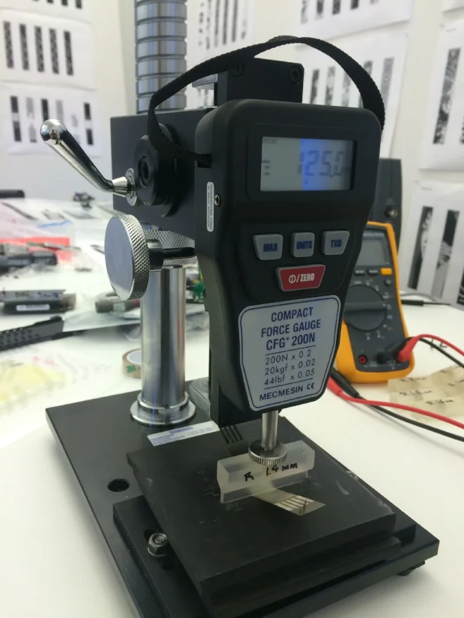  A major concern for the product was the minimum bend radius of the screen. Because the display is made of a series of laminated sheets, as you bend it the shear between the sheets increases very quickly. I did a lot of testing on samples that came d