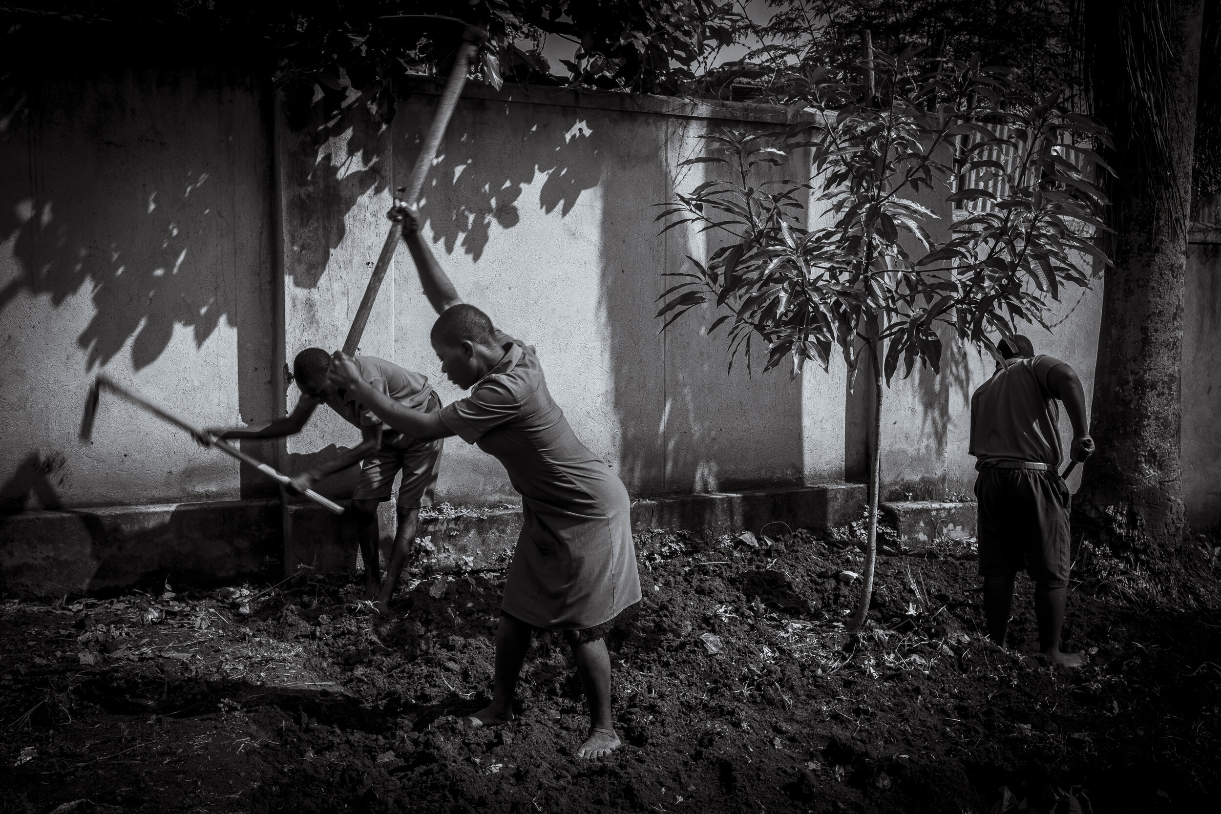  Entebbe, Uganda. Students at the Aamanyi Centre prepare a plot for planting during their ‘Agriculture’ class. The Aamanyi Centre is run by NGO EmbraceKulture and aims teach youth living with disability the life skills needed to live effectively amon
