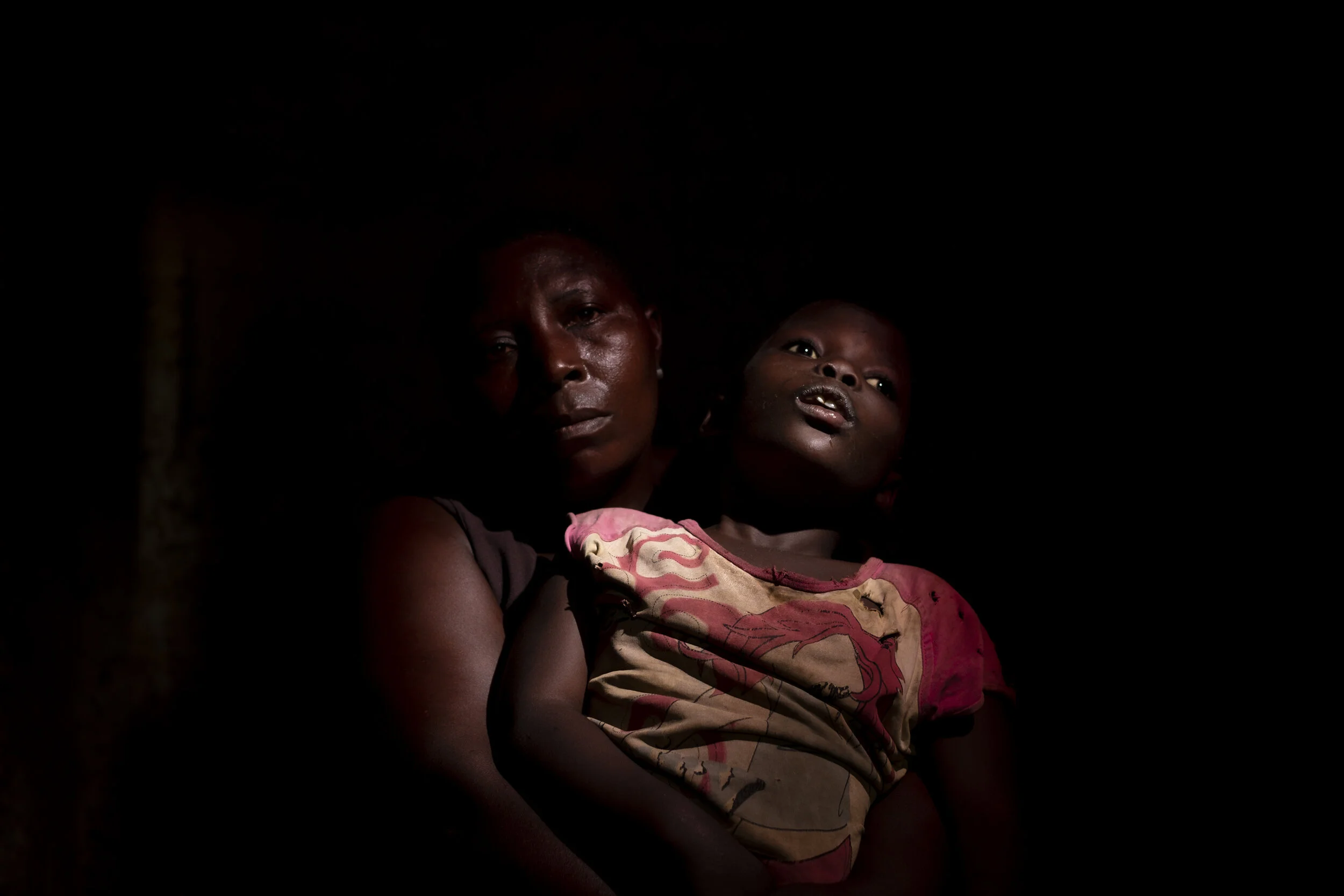  Lugonjo, Uganda. Salma Kobusinge lives with what is believed to be Autism. She does not speak, has Epilepsy, Sickle cells, is deaf and  blind in her right eye.  Her mother, Nono Zubeda  has told disability outreach worker Stephan Kabenge that she wi