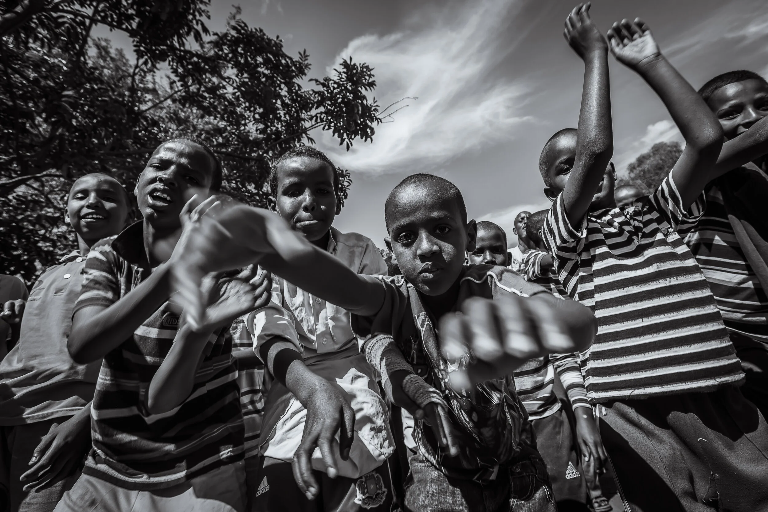  Nakivale, Uganda. Children take it upon themselves to stage a&nbsp; rally, protesting&nbsp; the increasing violence in the camp towards women. Approximately 400,000 reports of rape are recorded annually against women in the Democratic Republic of Co