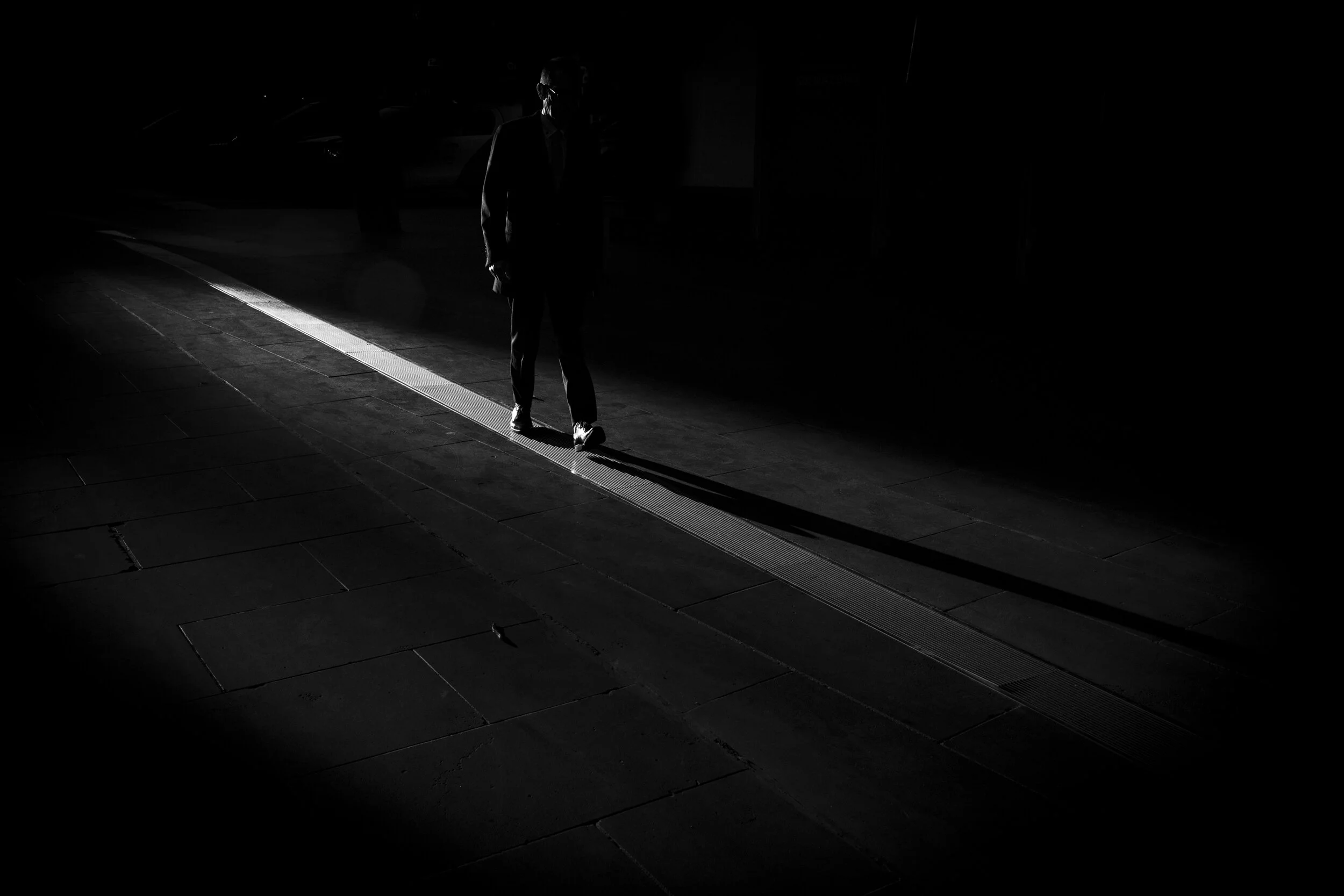 0805/20 08:24am Bourke Street, Melbourne. Early morning light strikes a quiet city and a lone office worker as restrictions are eased.  