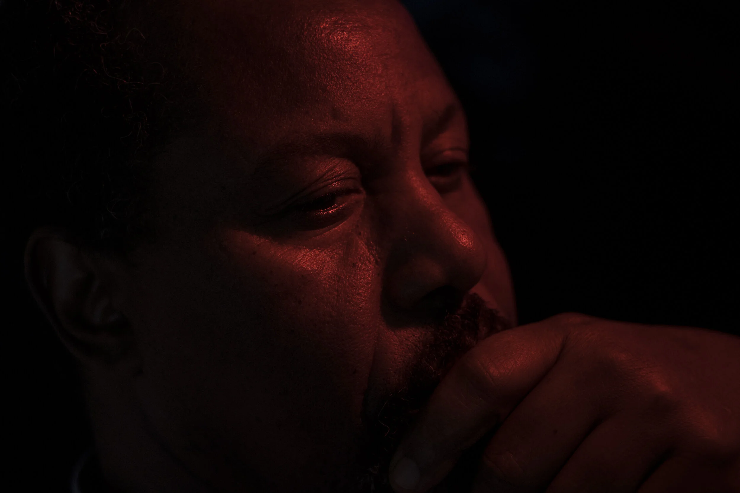  Elhadi Abass, formerly a journalist who fled the unrest in Sudan, has lived on the Flemington estate for 18 years. He has been a vocal  advocate for the residents during their communication with various agencies - health, cleaning, aid - working in 