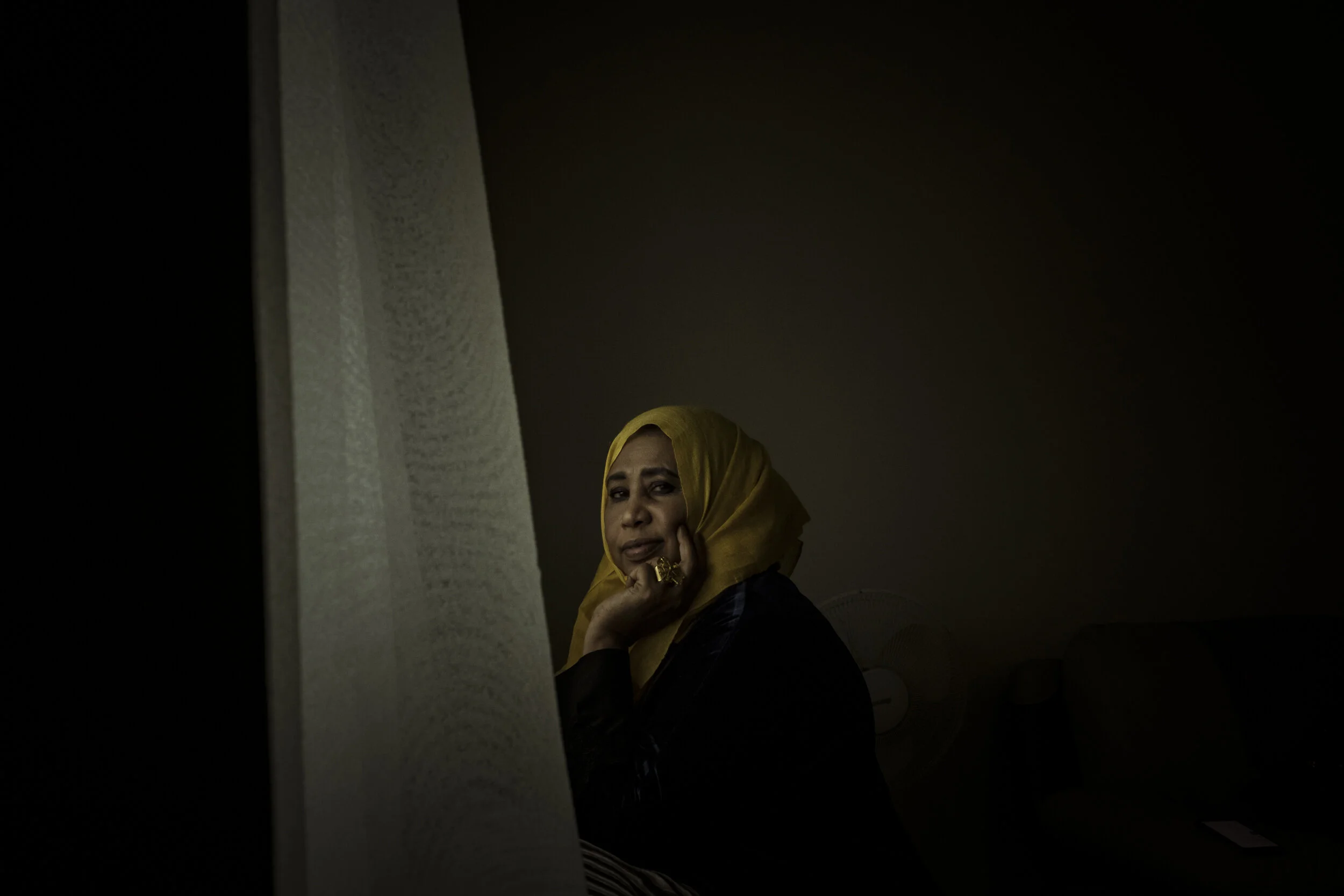  Awatif Taha, originally from Sudan, has lived on the Flemington estate for 18 years. With her husband Elhadi Abass, she has been involved in trying to improve relations between government and the residents in the wake of the 2020 lockdown. The gener