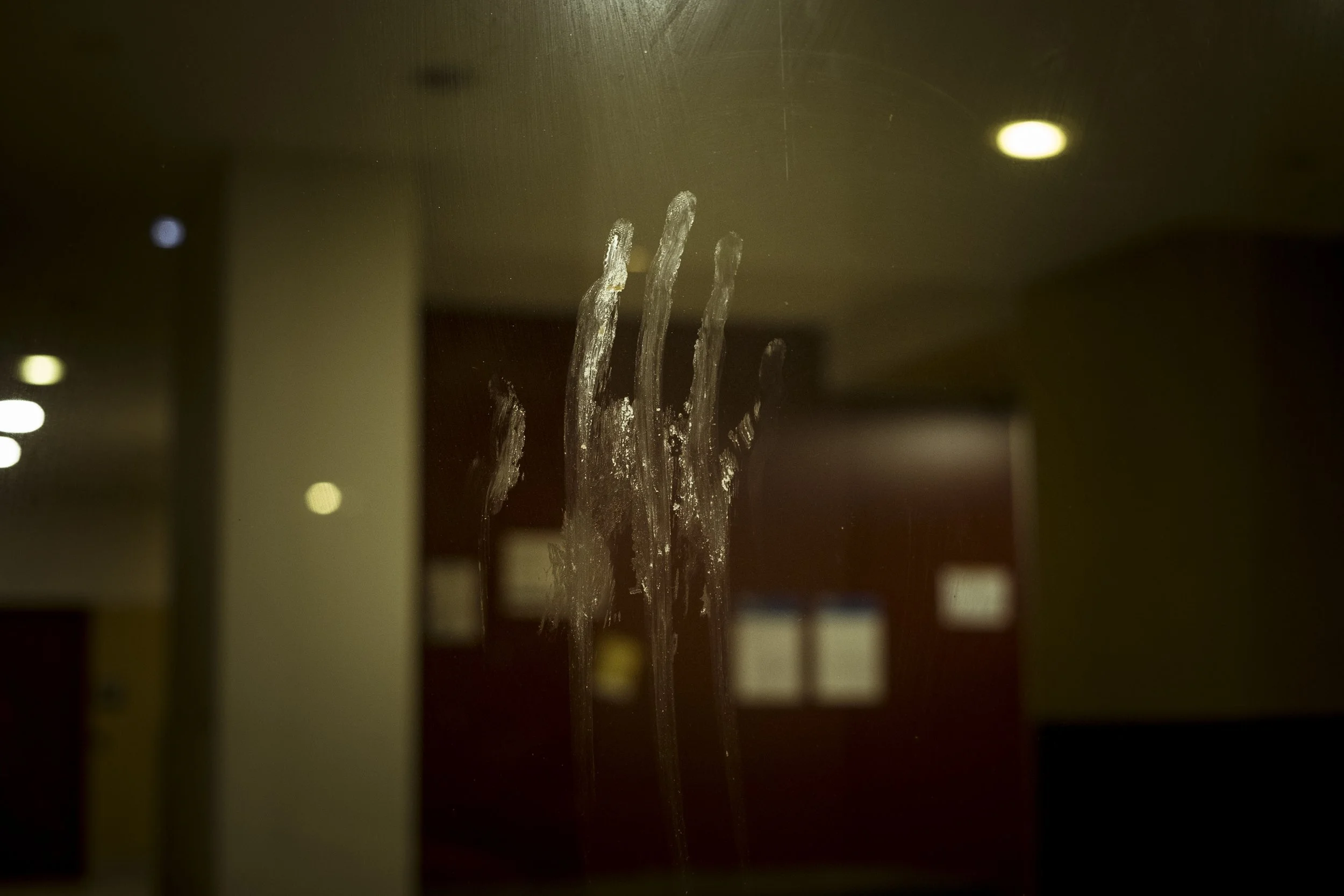  3 June 2021, 130 Racecourse Road, Flemington, Australia. The front entrance to the apartment complex at 130 Flemington is smeared with a handprint of an unknown substance.   Since the enforced lockdown in July 2020, deep cleaning for Covid-19 in the