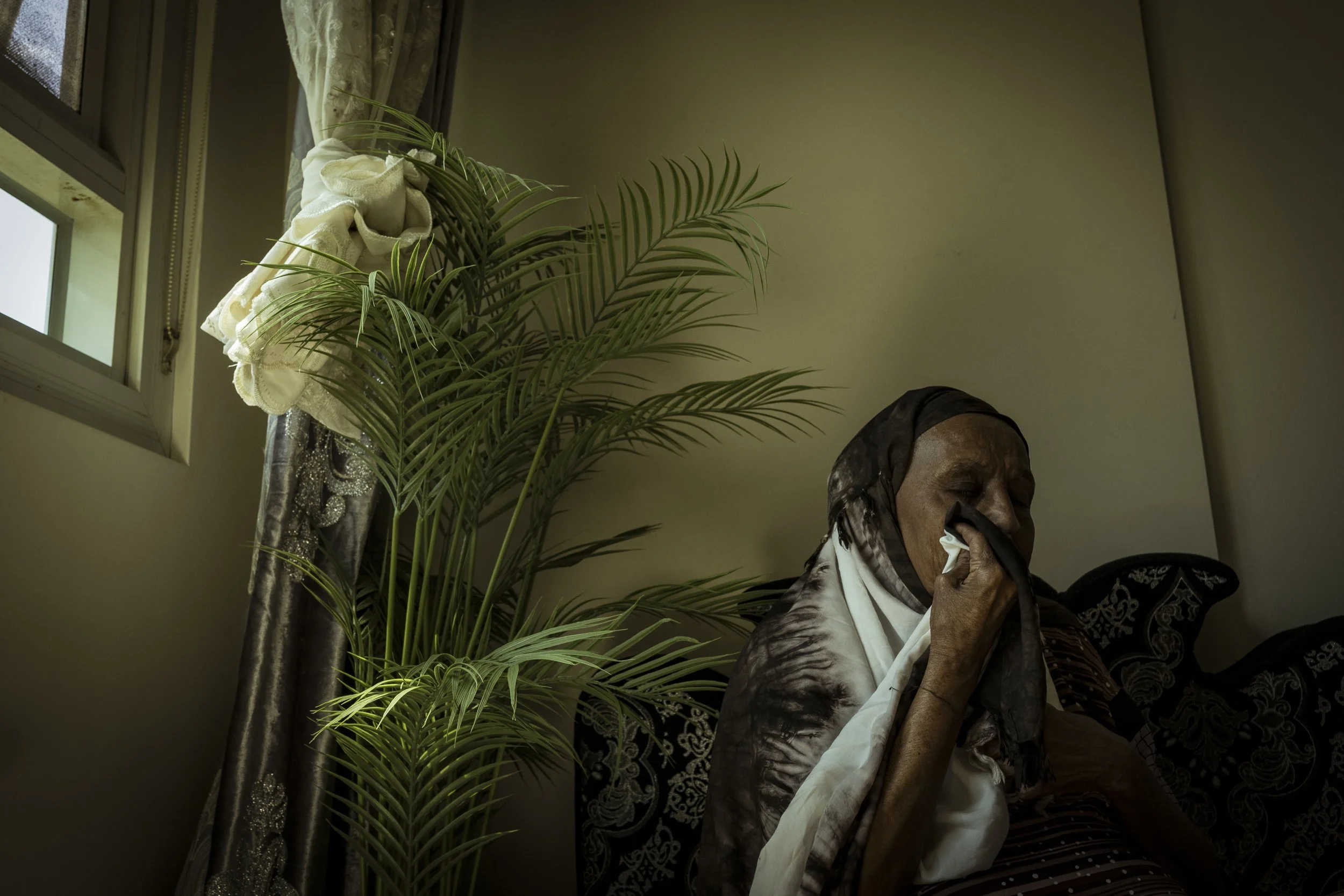  6 February 2025. 33 Alfred Street, North Melbourne, Australia. Hawa Del wipes away tears of frustration as she talks of her forced eviction from the North Melbourne towers.   Hawa has lived in her apartment for 34 years and the 58-year-old Somali Au