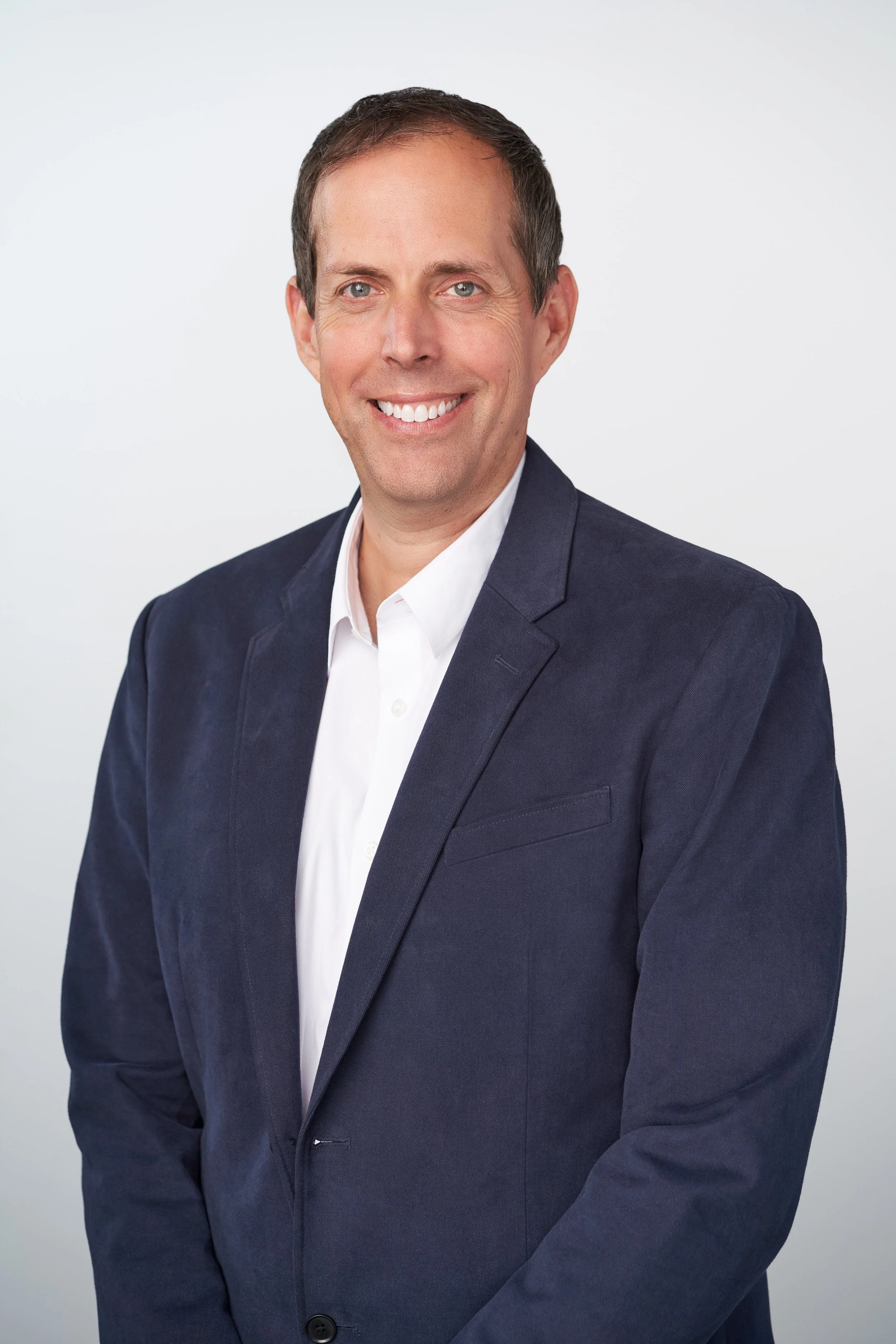 Corporate Headshot of Ryan Quam