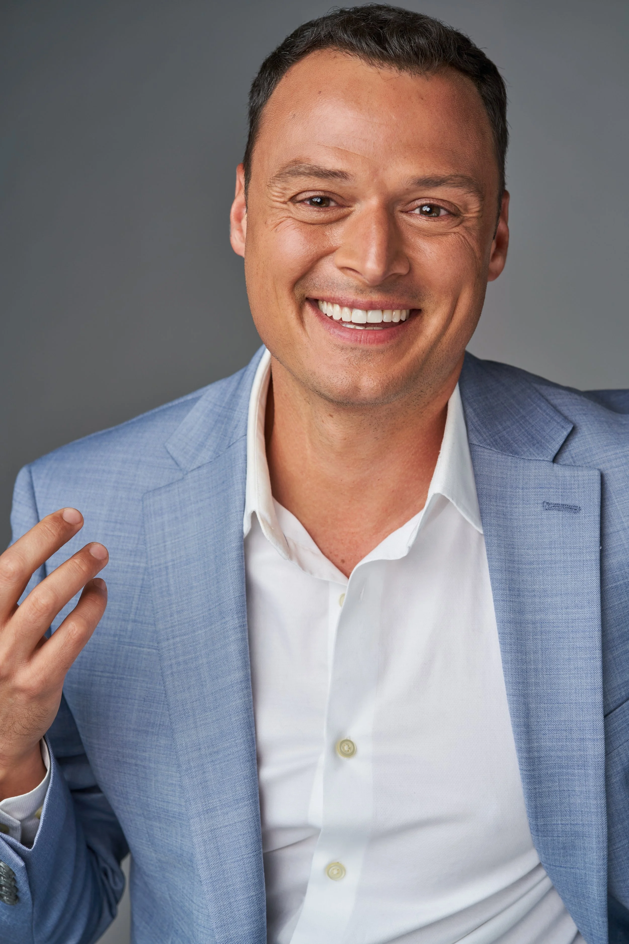 Corporate Headshot of Lee Osorio | Hair + Makeup by Anne-Marie Kennedy