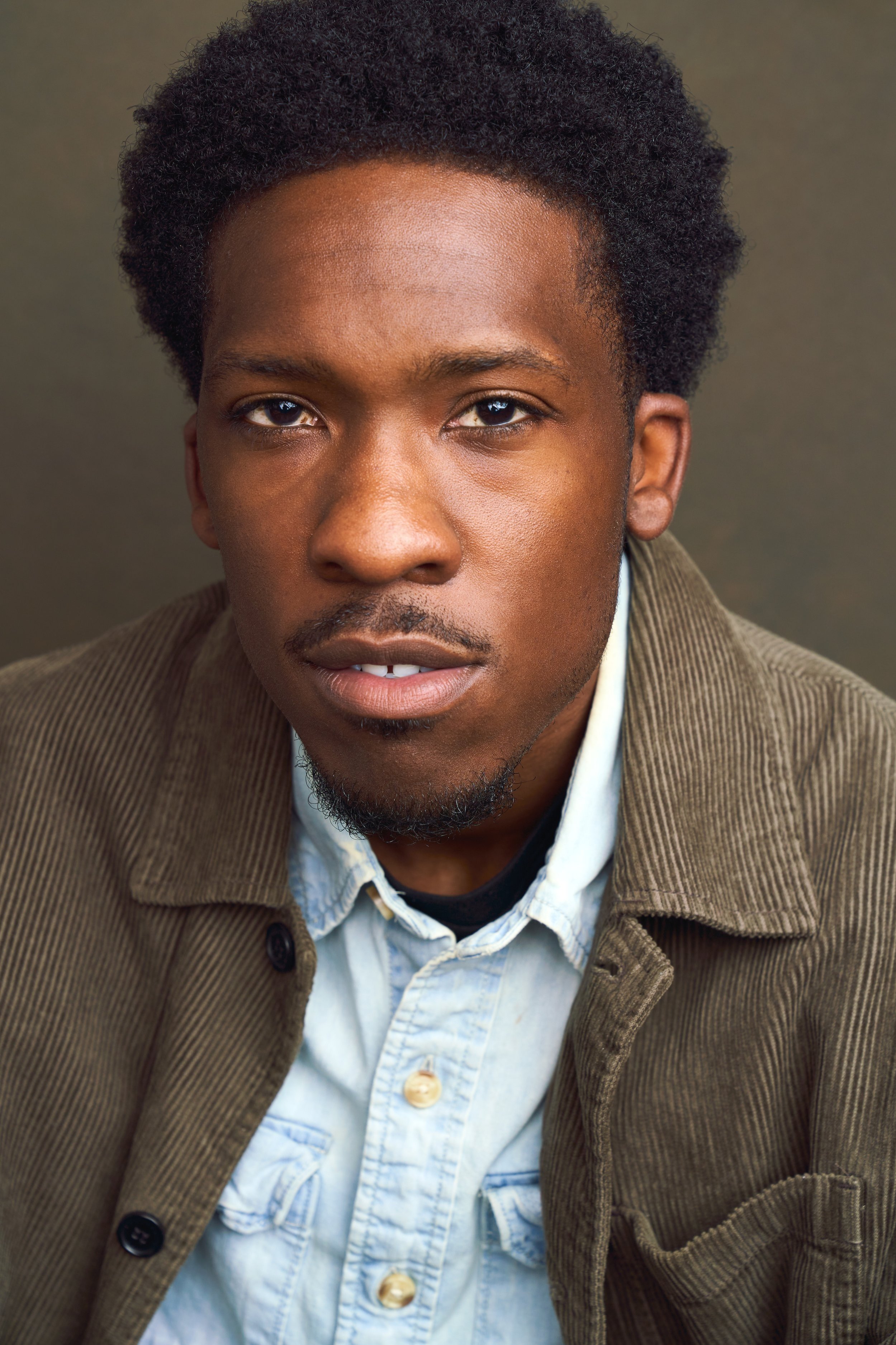 Character Headshot of Actor, Darian Rolle 