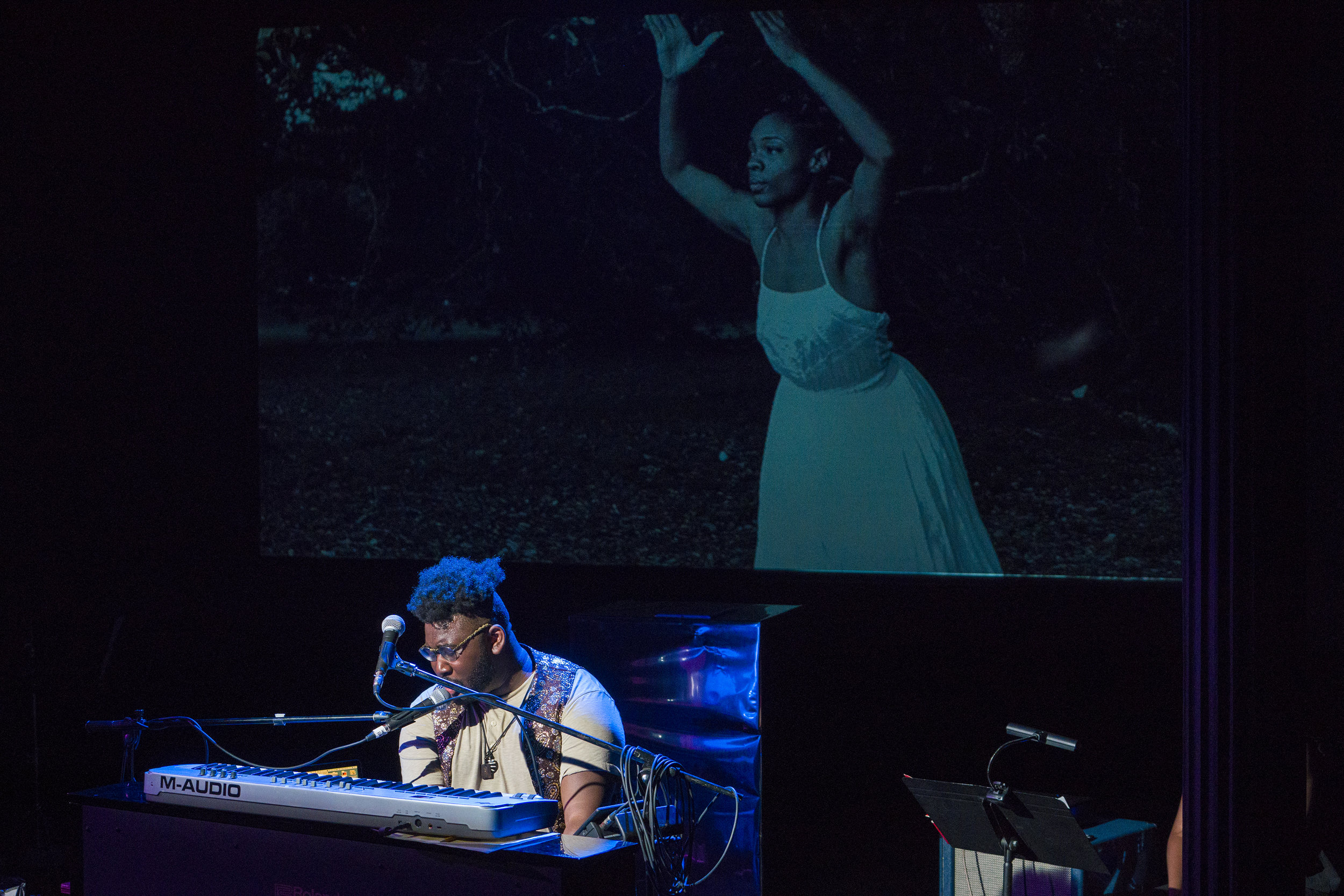 Tariq Al-Sabir performing original song cycle Unwanted Visuals: Monique Muse Dodd Dancer: Chanté Michele Photo Credit: Richard Termine (c) Mabou Mines