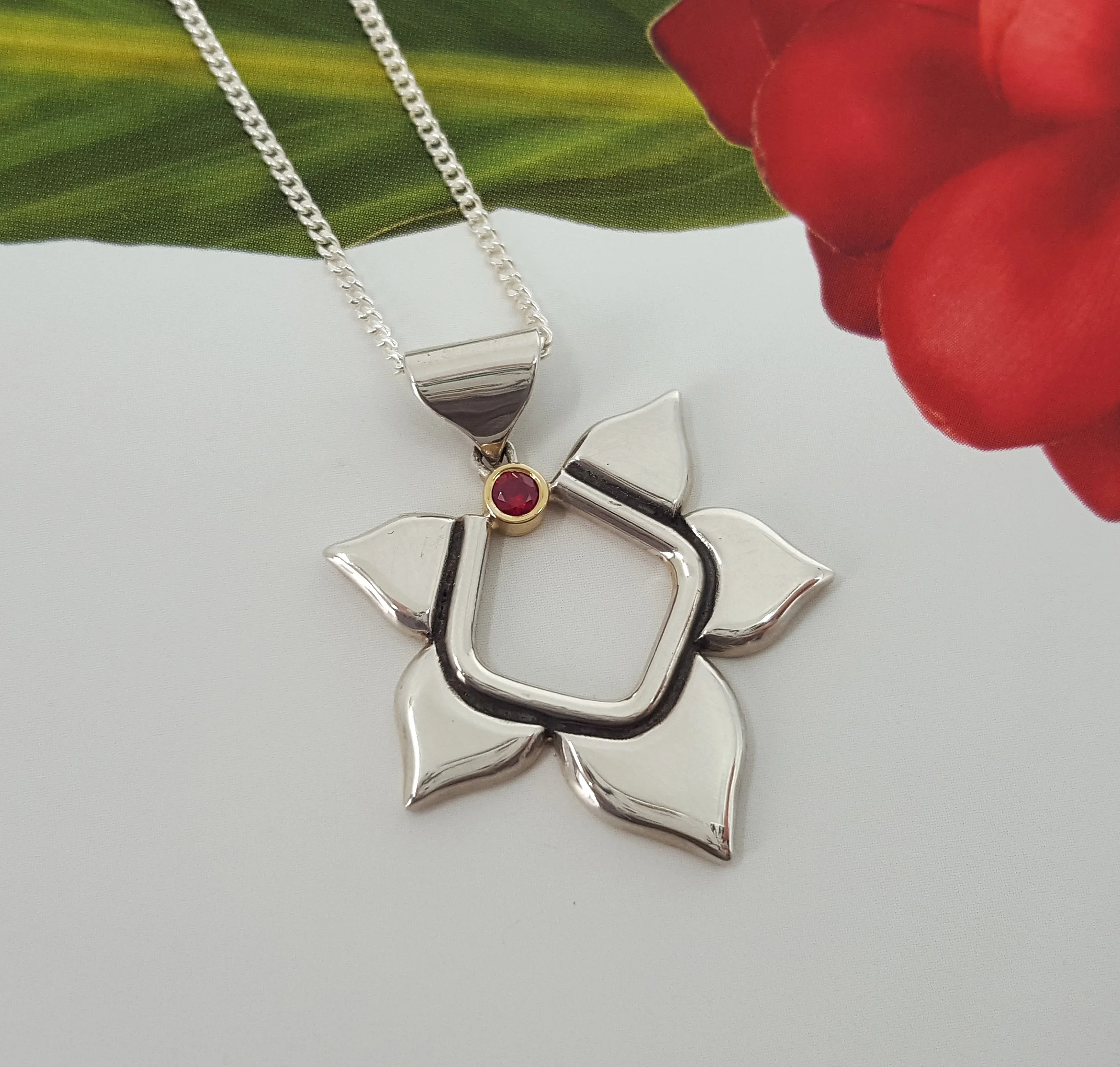 Innova - sterling silver with 9pt ruby set in 18ct yellow gold - SOLD