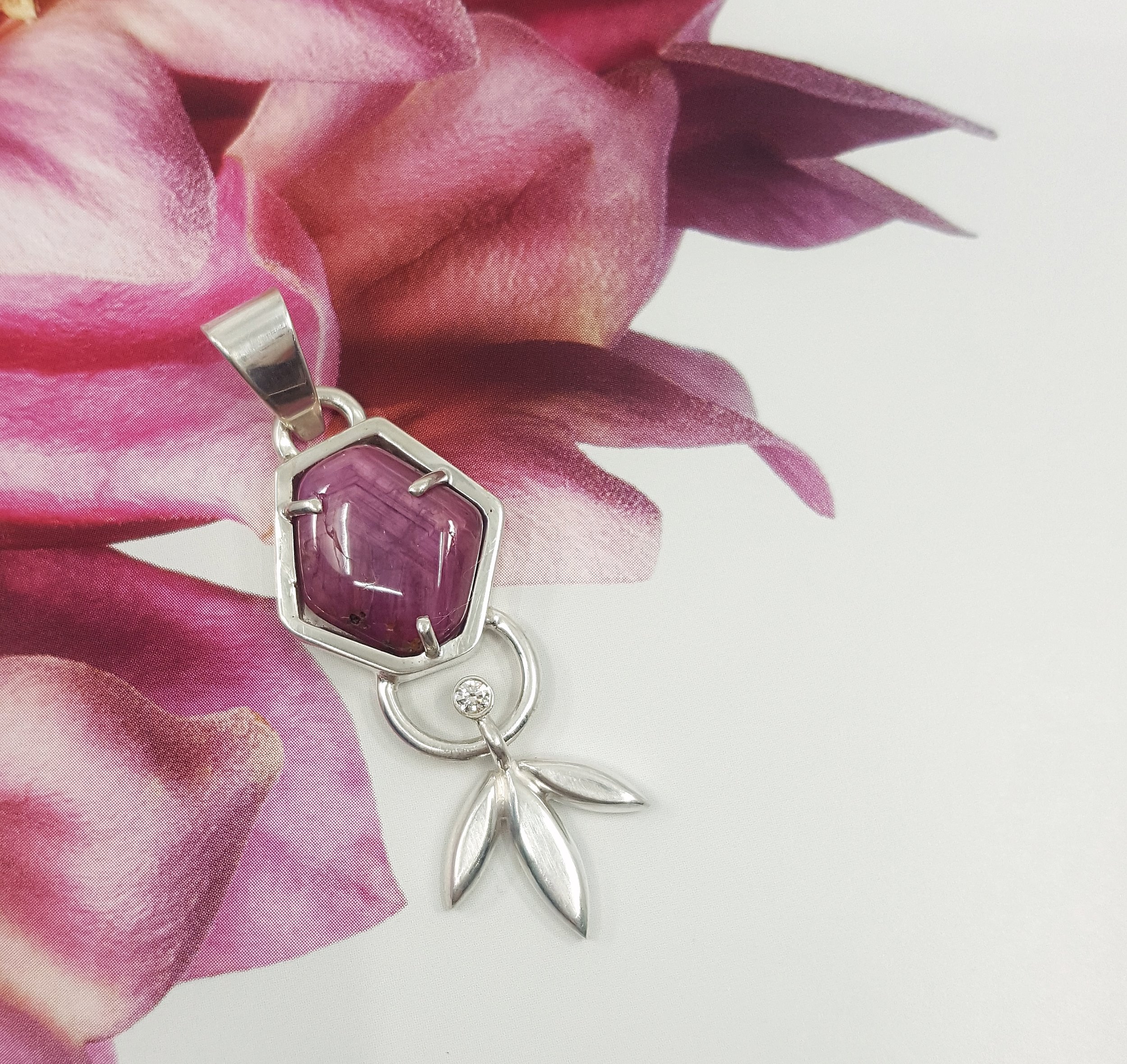 'Ruby Shield' - 11ct ruby cabochon, 4.5pt diamond