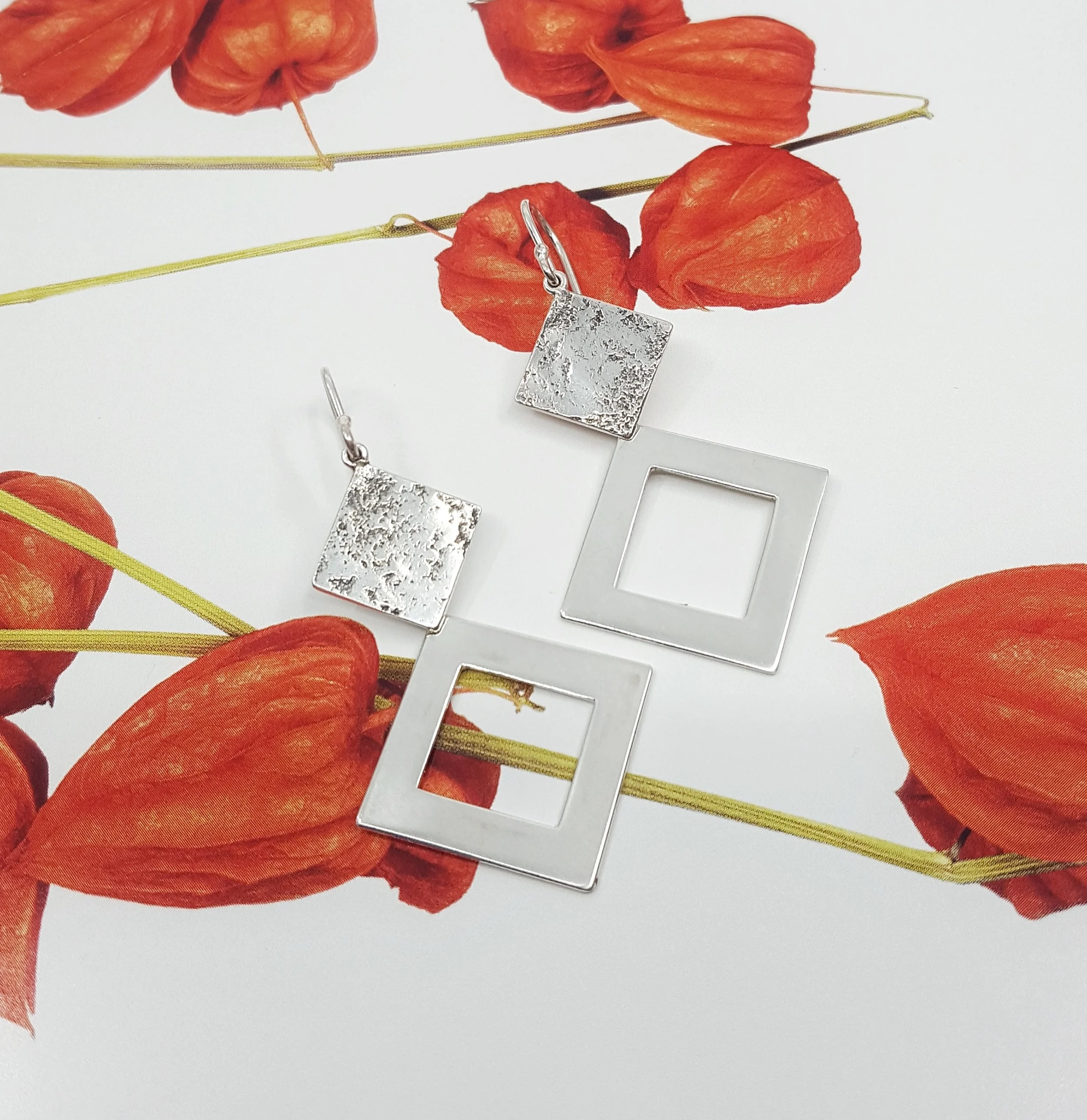 sterling sivler textured earrings - $239