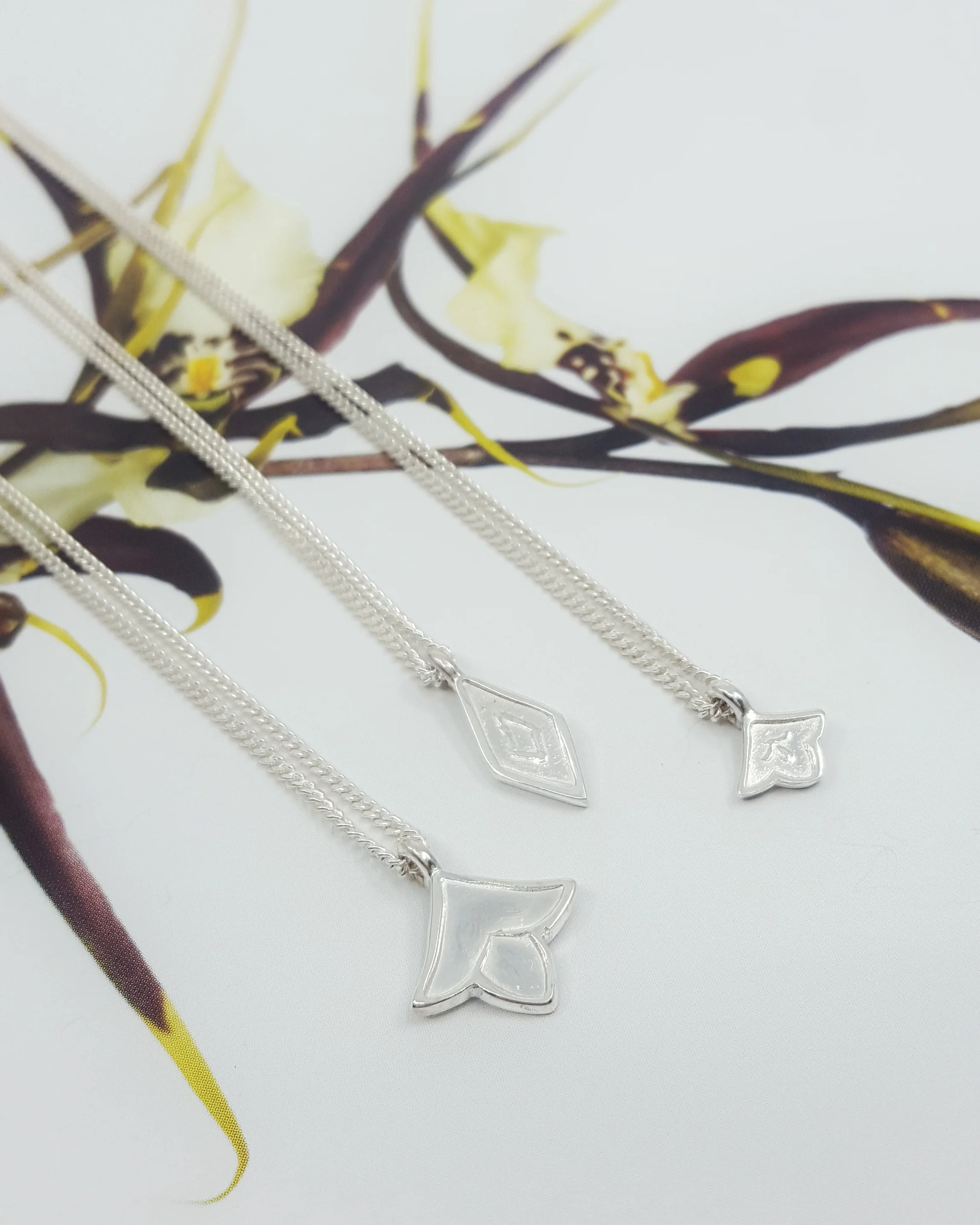 sterling silver charm necklaces - $120