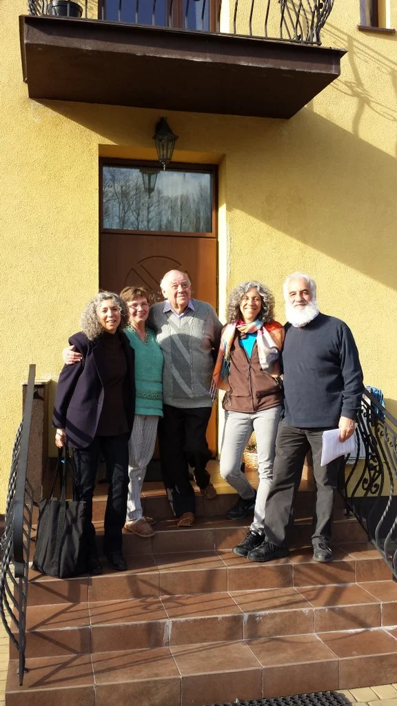 At the home in Grojec, Poland, where my father, his parents, and his sisters lived until November 1937: With my cousins Linda and Jonathan (at right), and with Teresa and Zenon Klim (center), the Polish couple who now own the house