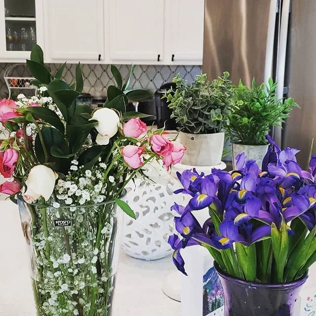 Beautiful birthday flowers are the best! #sellitquickhomestaging #blueiris #roses# birthdayflowers #kitchendecor #myfavorite