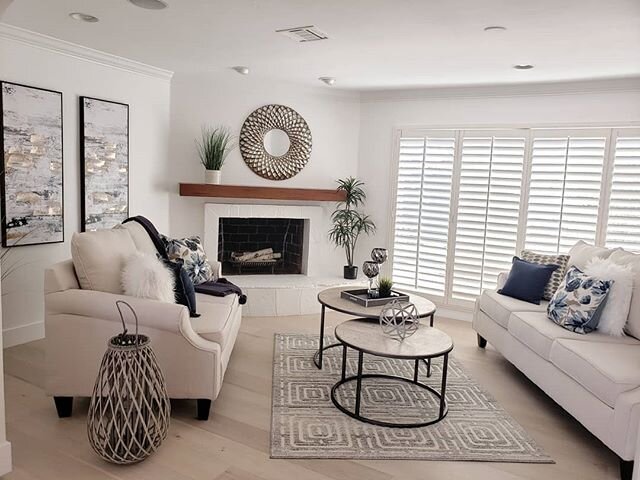 Cant you just curl up with a book by this fireplace!🤩#sellitquickhomestaging #design #homestaging #decor #livingroomdecor #lovemyjob #lightandbright #navyandcream #metalaccessories #oversizedlivingroom